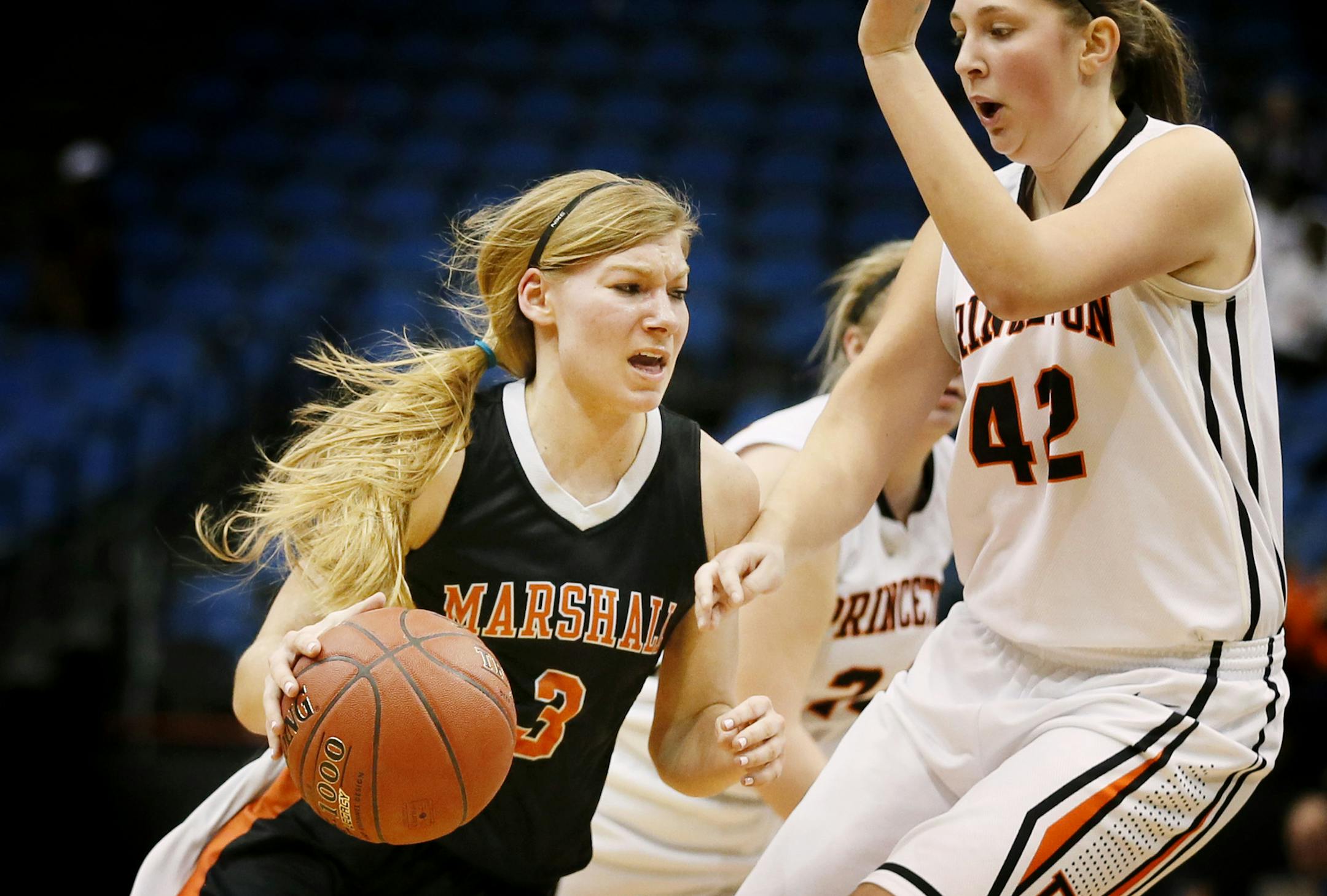 Marshall Sarah Buysse drove to the basket on Princeton Jenna Doyle in the first half . Princeton played Marshall in girls Class 3A quarterfinal action March 17, 2015 in Minneapolis, Minnesota. ] Jerry Holt/ Jerry.Holt@Startribune.com
