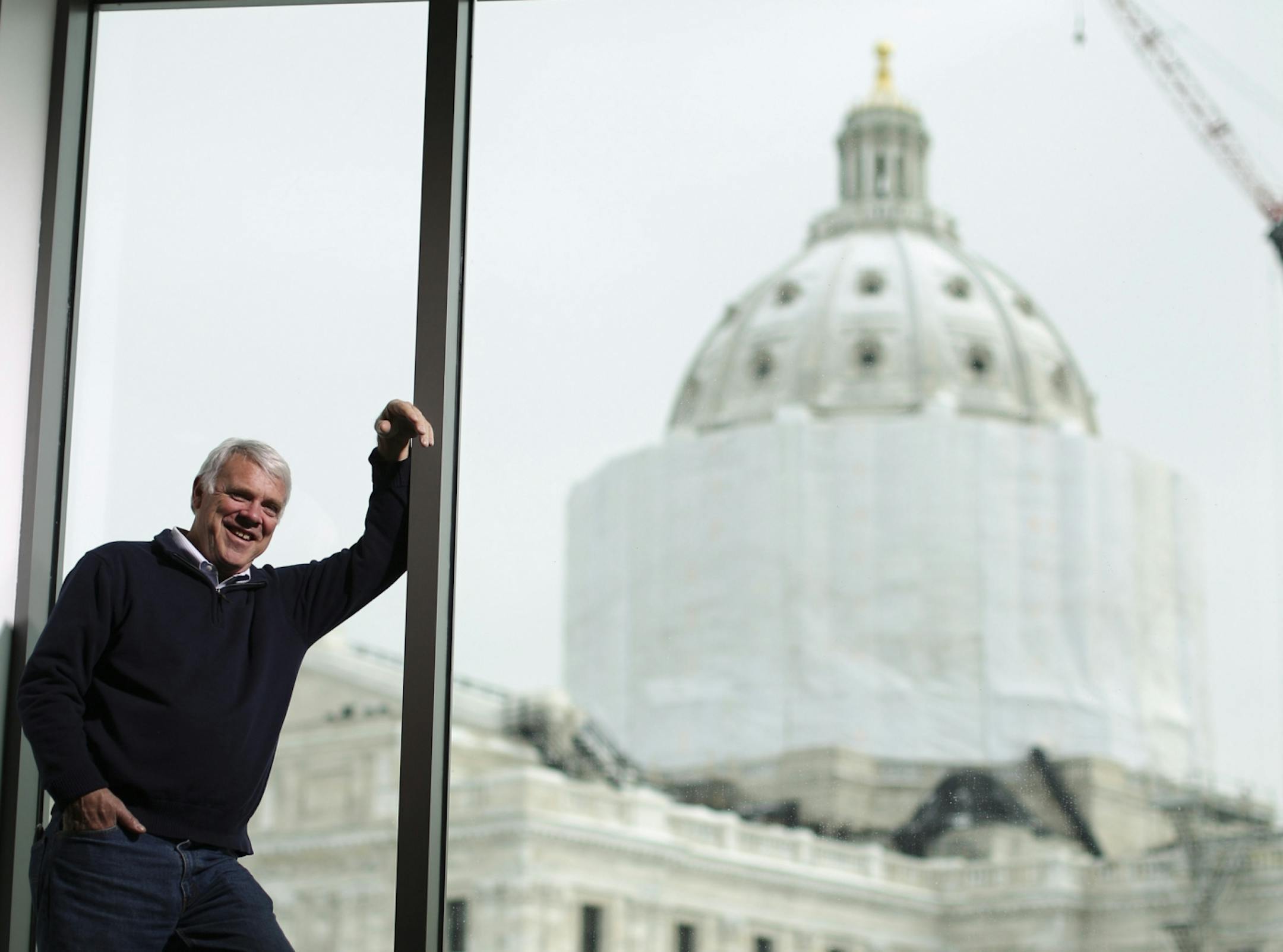 John Kaul, posing in the new Minnesota Senate Building, says: "I'm an artist locked in the body of a lobbyist."