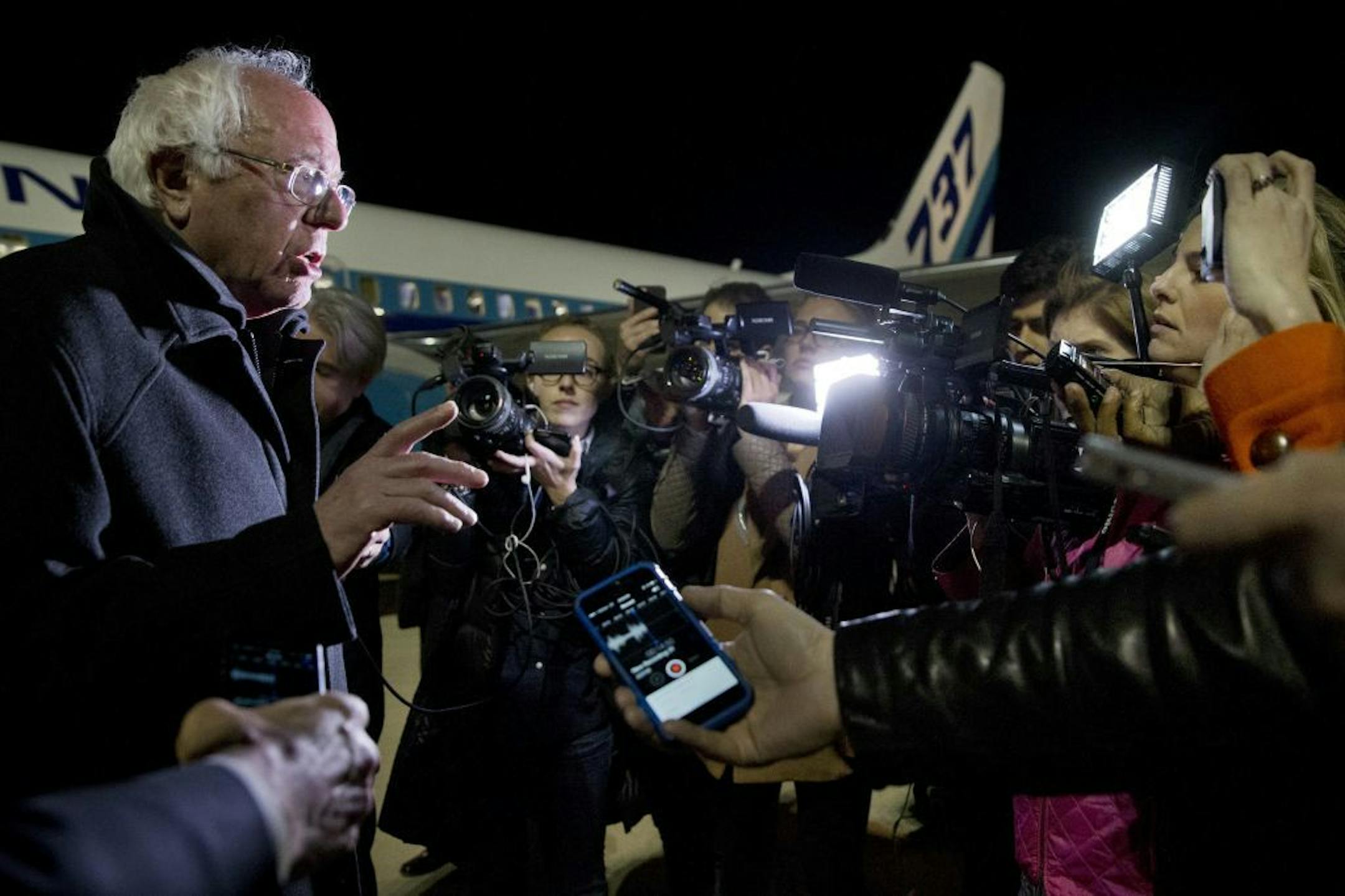 Democratic presidential candidate Sen. Bernie Sanders, I-Vt., speaks to members of the traveling media about his loss to Hillary Clinton in the South Carolina primary, on arrival in Rochester, Minn., Saturday, Feb. 27, 2016.