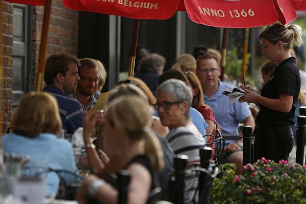 In downtown Excelsior, Jake O'Connor's restaurant, the beautiful weather brought out the crowds for outdoor dining.] rtsong-taatarii@startribune.com