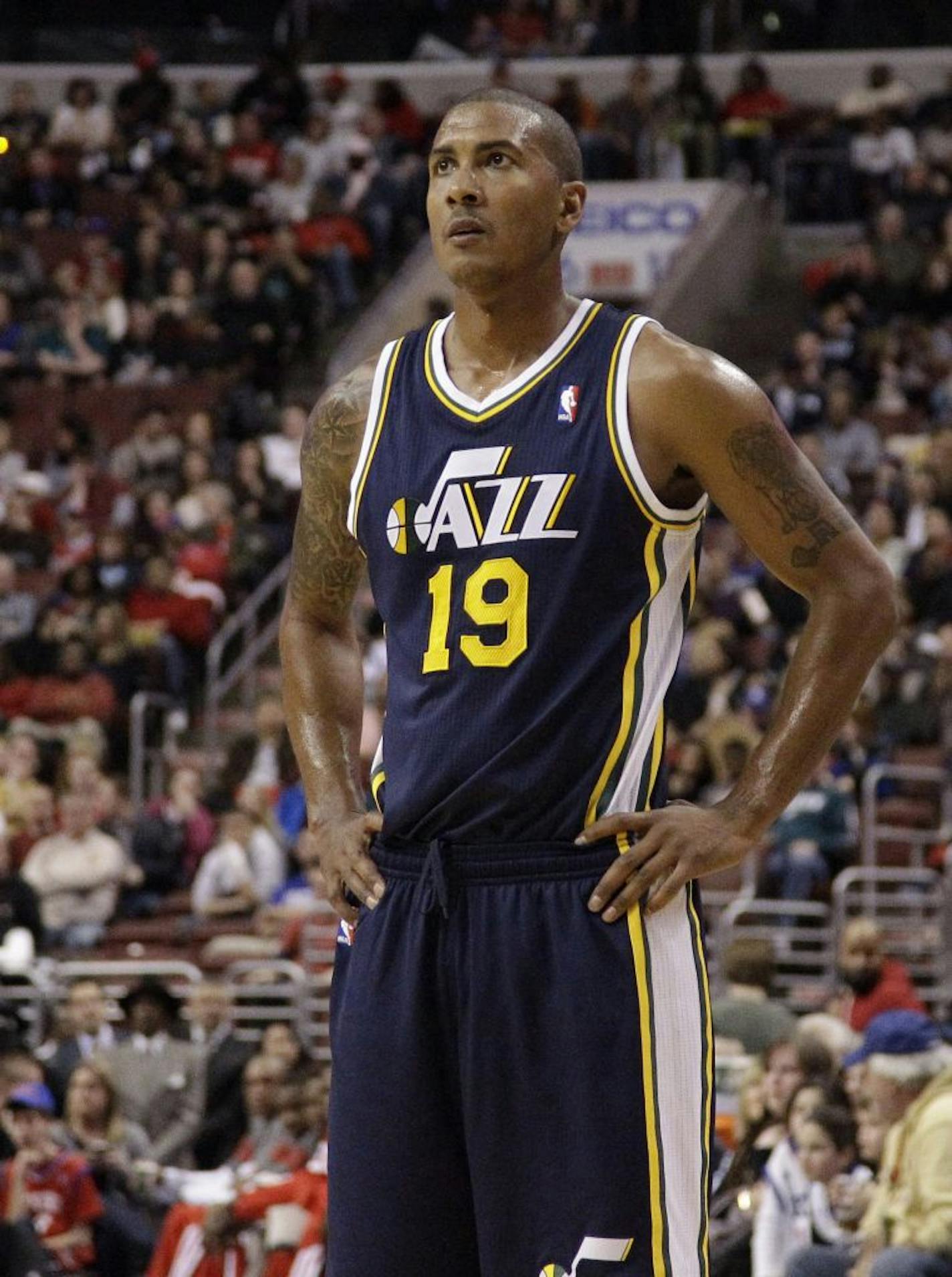 FILE - In this March 9, 2012, file photo, Utah Jazz's Raja Bell looks on during an NBA basketball game against the Philadelphia 76ers in Philadelphia. Bell says his career with the Utah Jazz is over, calling the damage "irreparable" and saying coach Tyrone Corbin was "unprofessional" because of a lack of communication.