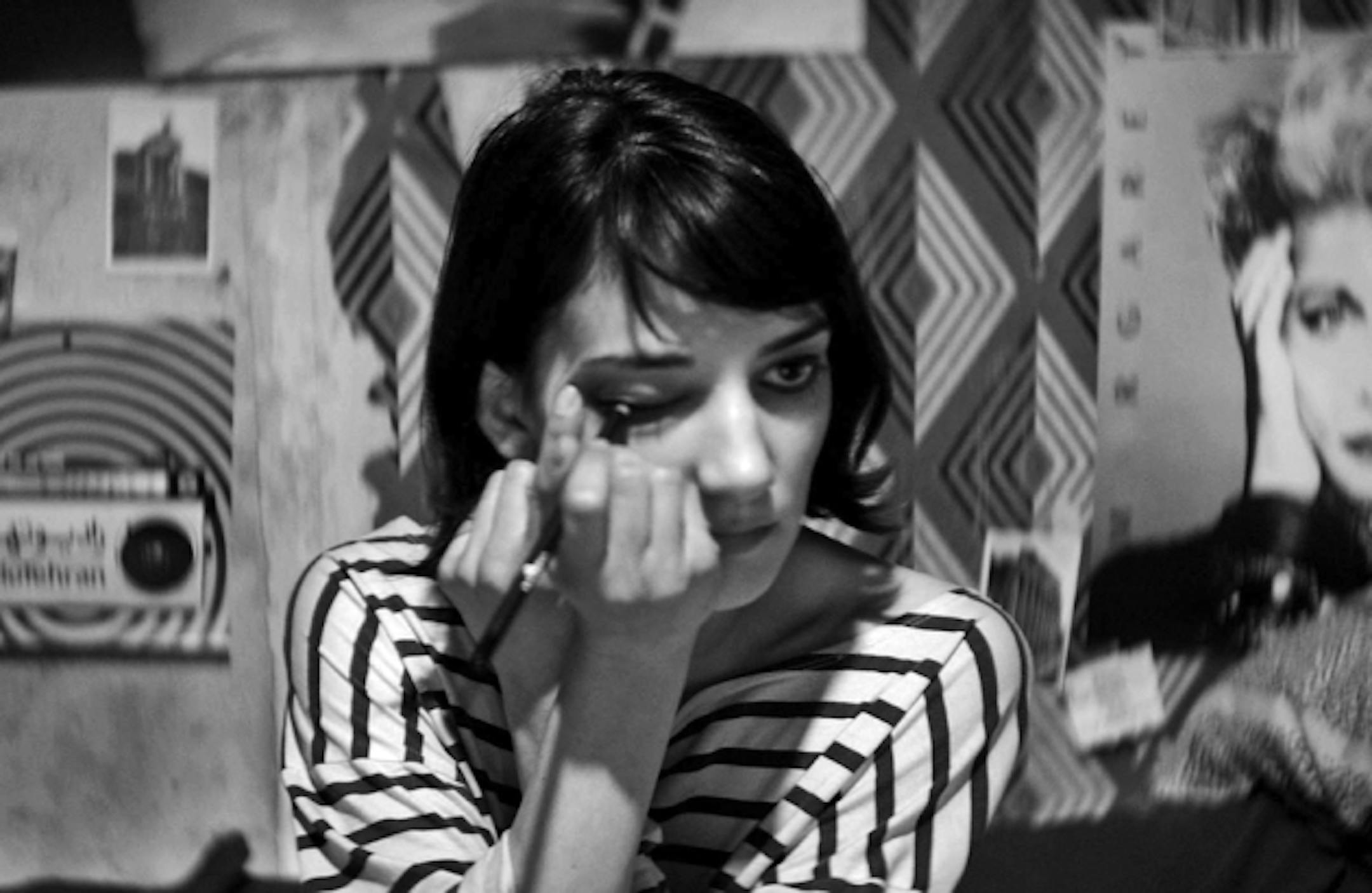 Sheila Vand prepares for a night on the town in the Iranian-themed vampire film "A Girl Walks Home Alone at Night." Walker Art Center