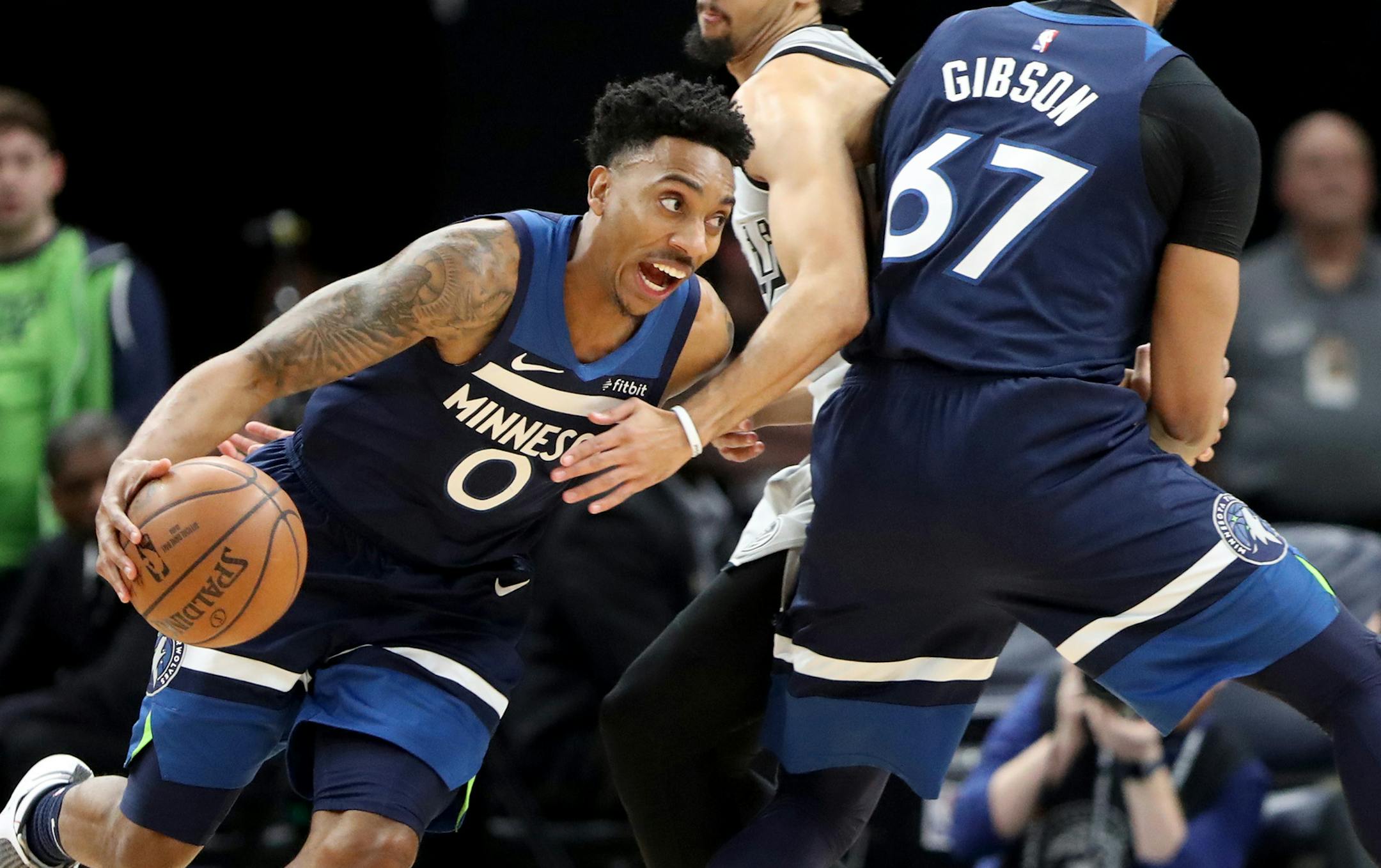 The Minnesota Timberwolves Taj Gibson (67) sets a pick against the San Antonio Spurs' Derrick White (4) for teammate Jeff Teague (0) during the first half Friday, Jan. 18, 2019, at the Target Center in Minneapolis, MN.] DAVID JOLES &#x2022; david.joles@startribune.com San Antonio Spurs versus the Minnesota Timberwolves