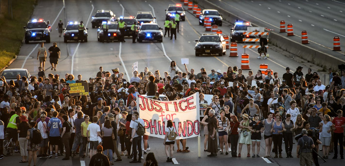 Black Lives Matter protest occupied I-94 for four hours. ] GLEN STUBBE * gstubbe@startribune.com Saturday, July 9, 2016 Black Lives Matter protest started in front of the Governor's Residence on Summit Avenue. From there protesters marched onto Lexington Ave and turned onto I-94 which they occupied for four hours. ORG XMIT: MIN1607100423423098