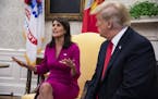 President Donald Trump is joined by Nikki Haley, his ambassador to the United Nations, at the White House in Washington, Oct. 9, 2018. Haley said here