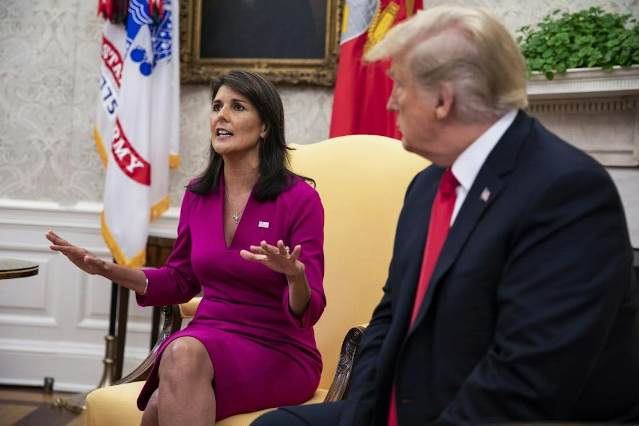 President Donald Trump is joined by Nikki Haley, his ambassador to the United Nations, at the White House in Washington, Oct. 9, 2018. Haley said here that she would resign her post at the end of the year, marking a high-profile departure of one of the few women in Trump's cabinet. Haley said she had no intention of running for president in 2020.