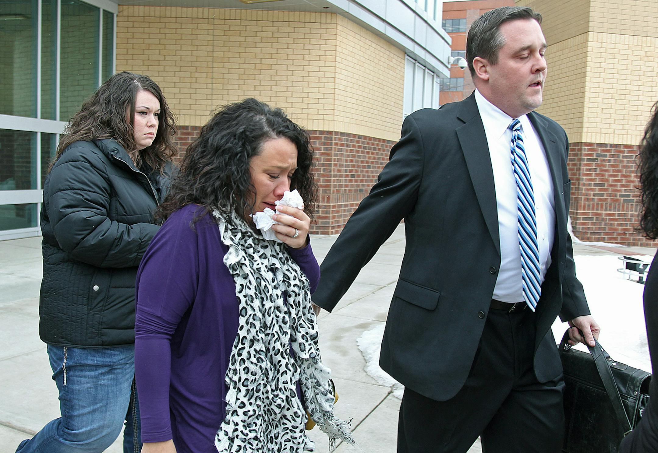 Jeffrey D. Trevino's family and attorney made their way out of the Ramsey County Law Enforcement Center, Thursday, February 28, 2013 in St. Paul, MN, after Jeffrey D. Trevino's arraignment. (ELIZABETH FLORES/STAR TRIBUNE) ELIZABETH FLORES • eflores@startribune.com