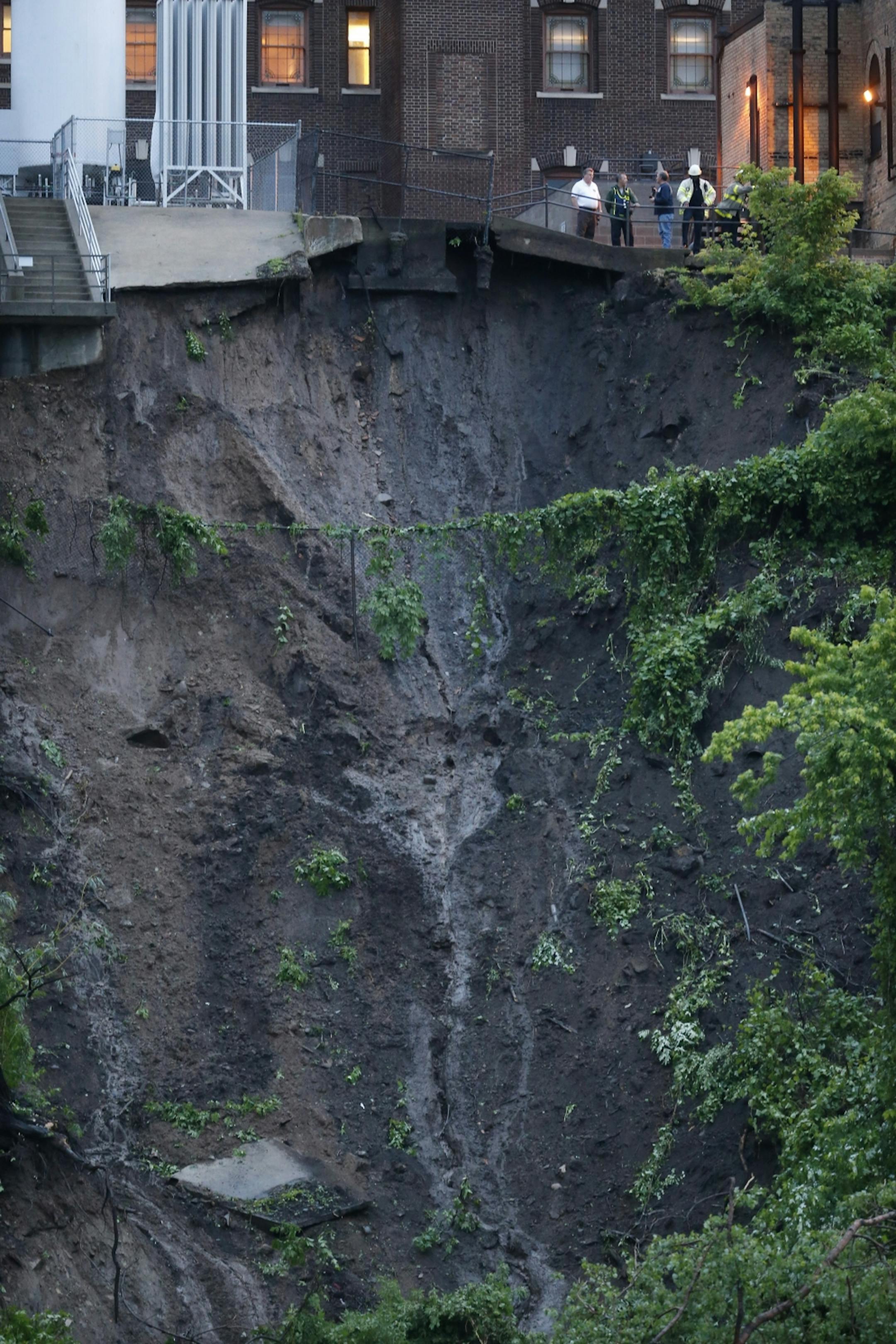 A mudslide on West River Road threatens the Fairview Hospital on the West Bank.