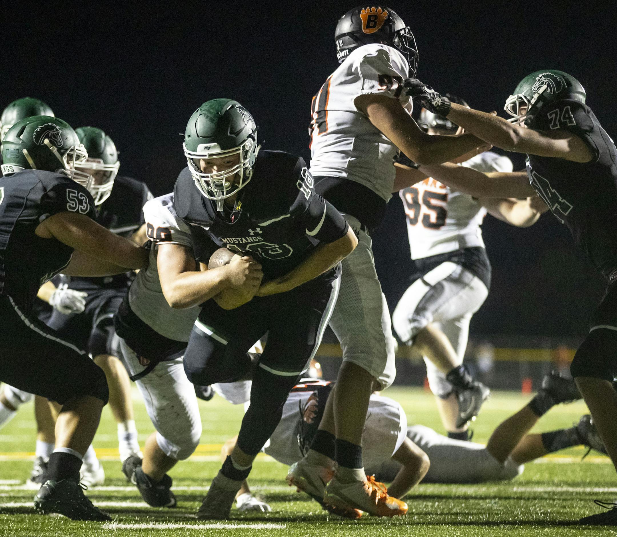 Mounds View quarterback Cole Stenstrom (16) rushed for a touchdown in the second half of the game on Friday.]
ALEX KORMANN • alex.kormann@startribune.com Mounds View took on White Bear Lake at home in Arden Hills, MN on Friday September 6, 2019.