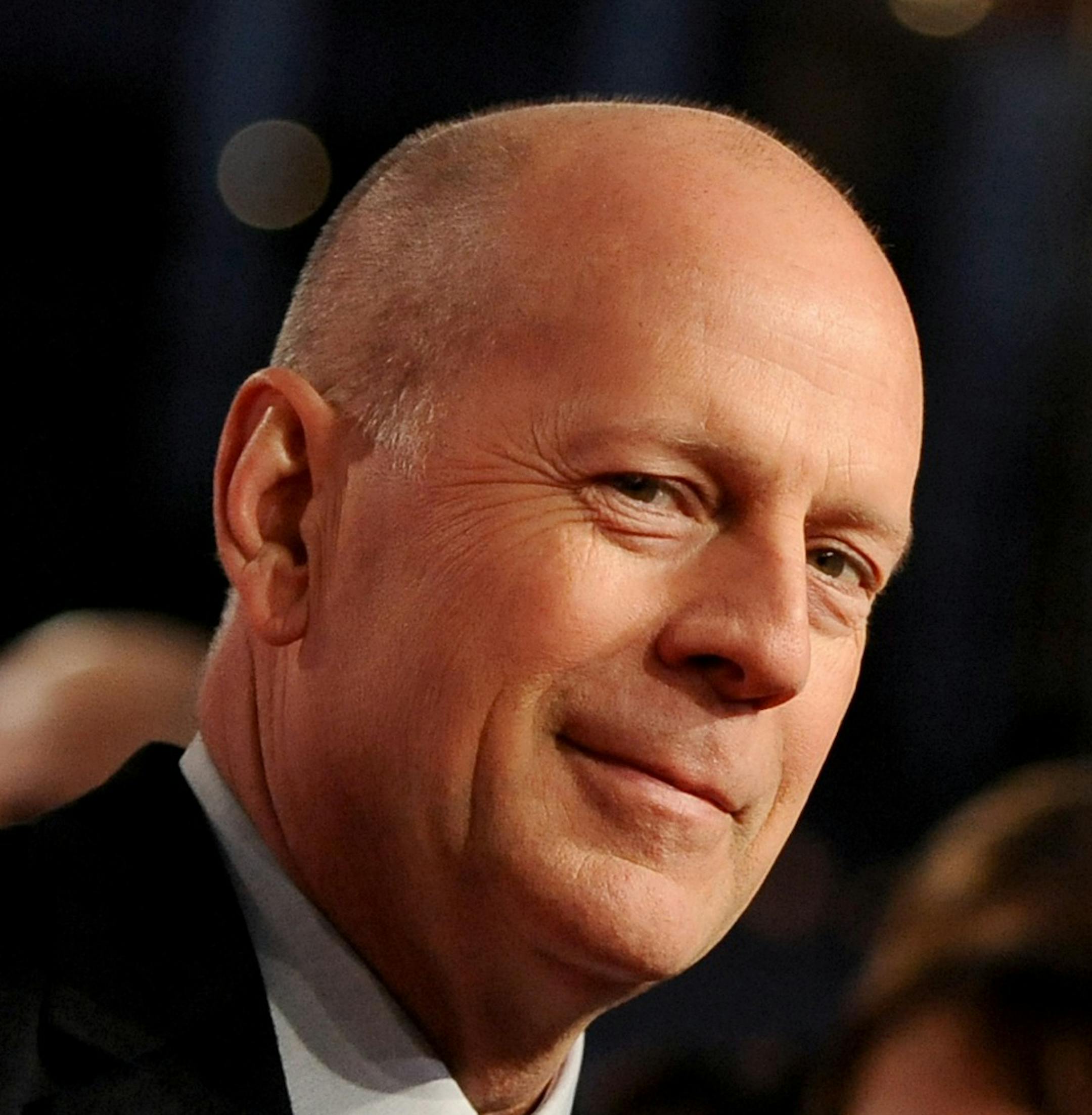 In this picture made available Tuesday Feb. 5, 2013, US actor Bruce Willis , arrives for the premiere of the movie 'A Good Day to Die Hard' in Berlin, Germany, Monday Feb. 4, 2013. (AP Photo/dpa, Britta Pedersen) ORG XMIT: MIN2013021309251515