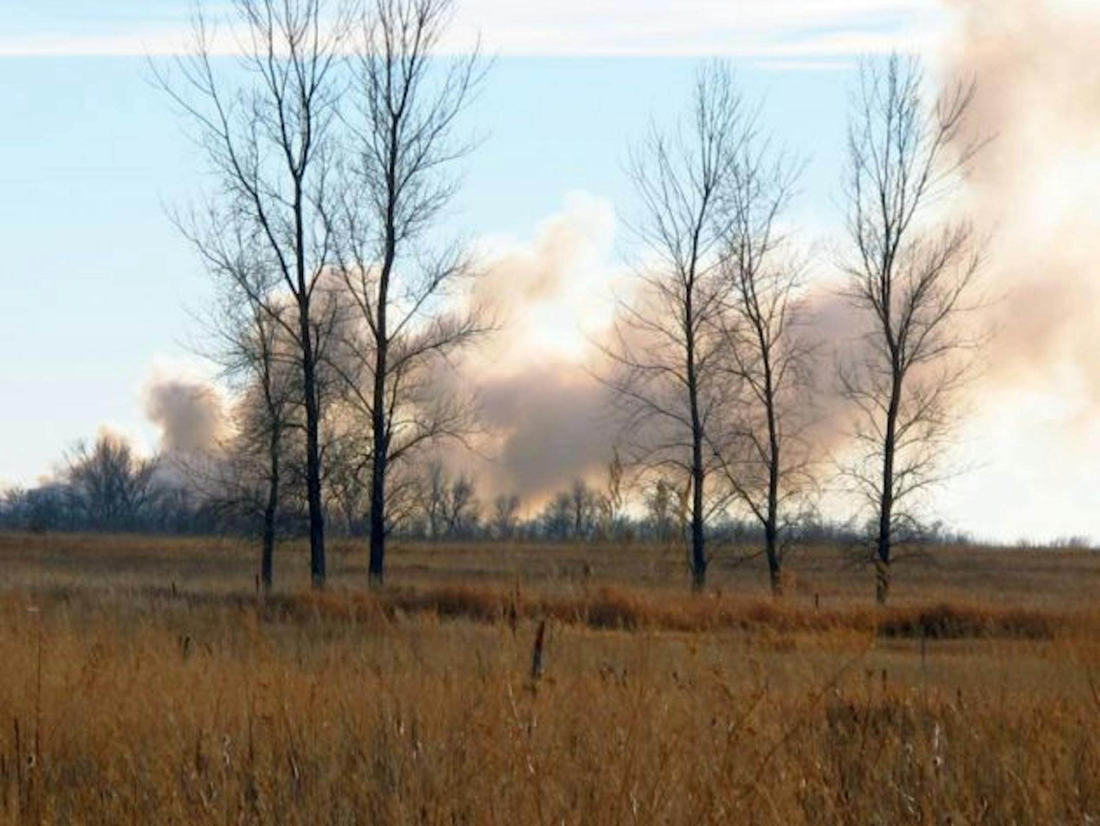 A burning South Dakota cattail slough filled the sky with smoke today.