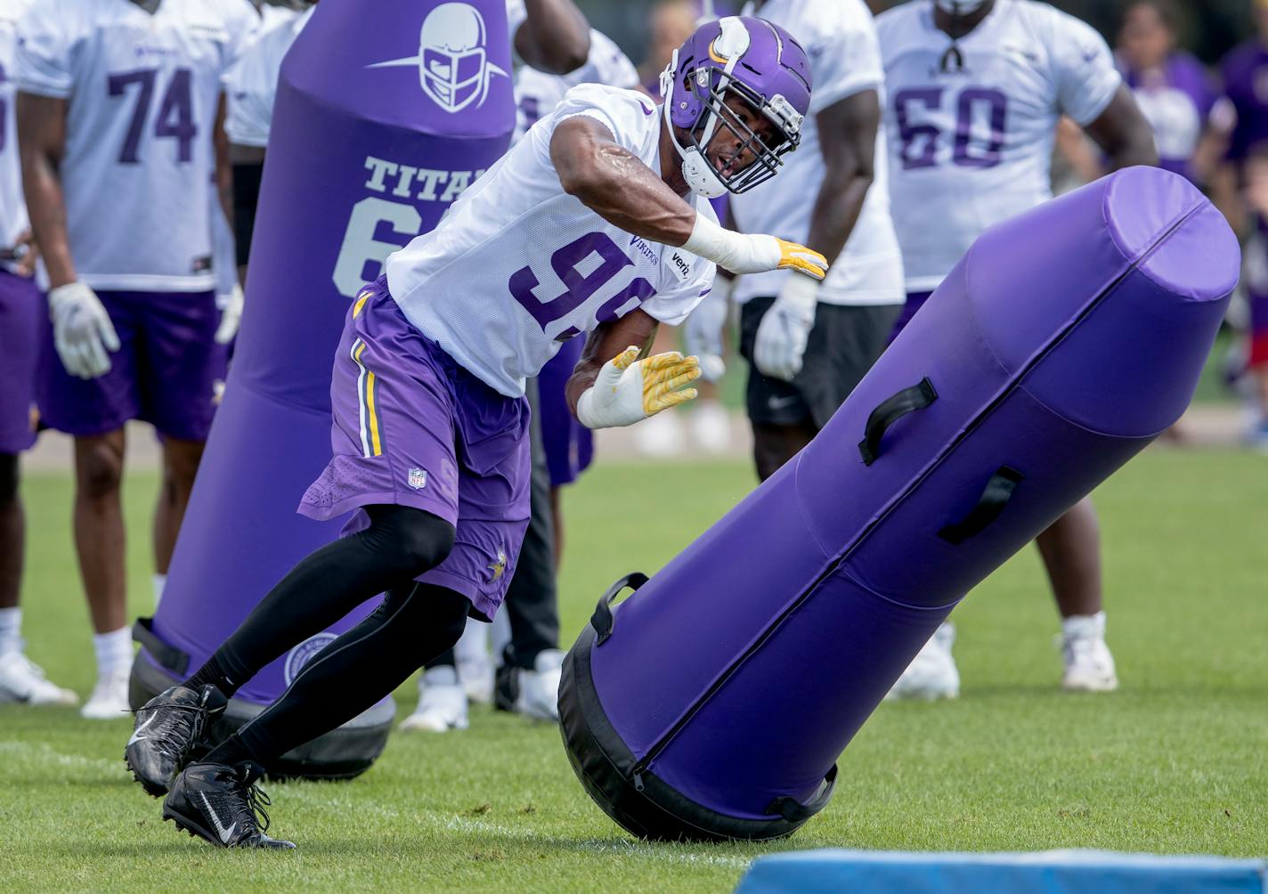 Danielle Hunter (99) and the Vikings defense took command of Tuesday's practice session, with young players making four interceptions during 11-on-11 drills.