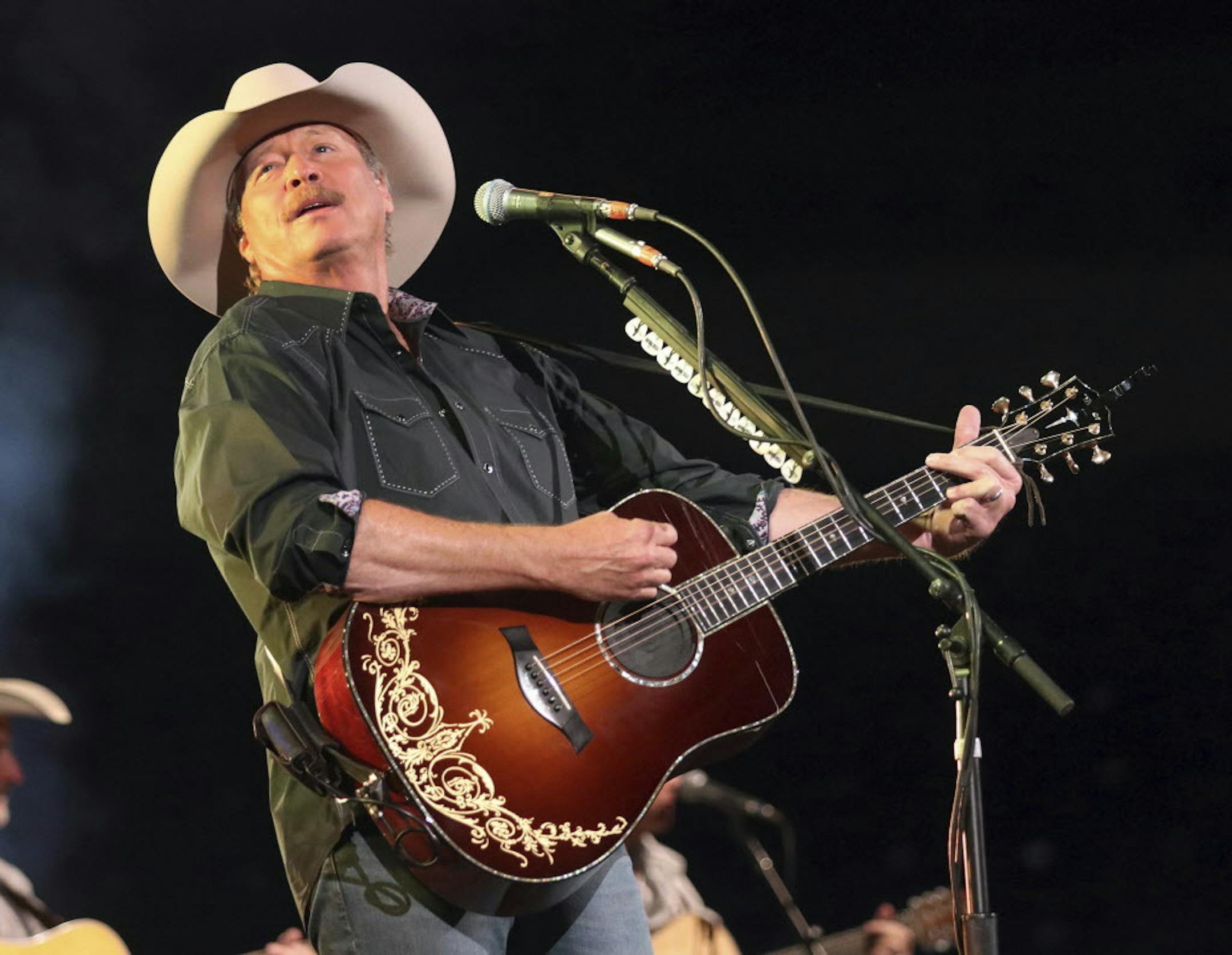 Alan Jackson performs at the Mohegan Sun Arena at Casey Plaza in Wilkes Barre, Pa., during his Honky Tonk and Highway Tour on Friday, April 21, 2017. (Dave Scherbenco/The Citizens' Voice via AP)