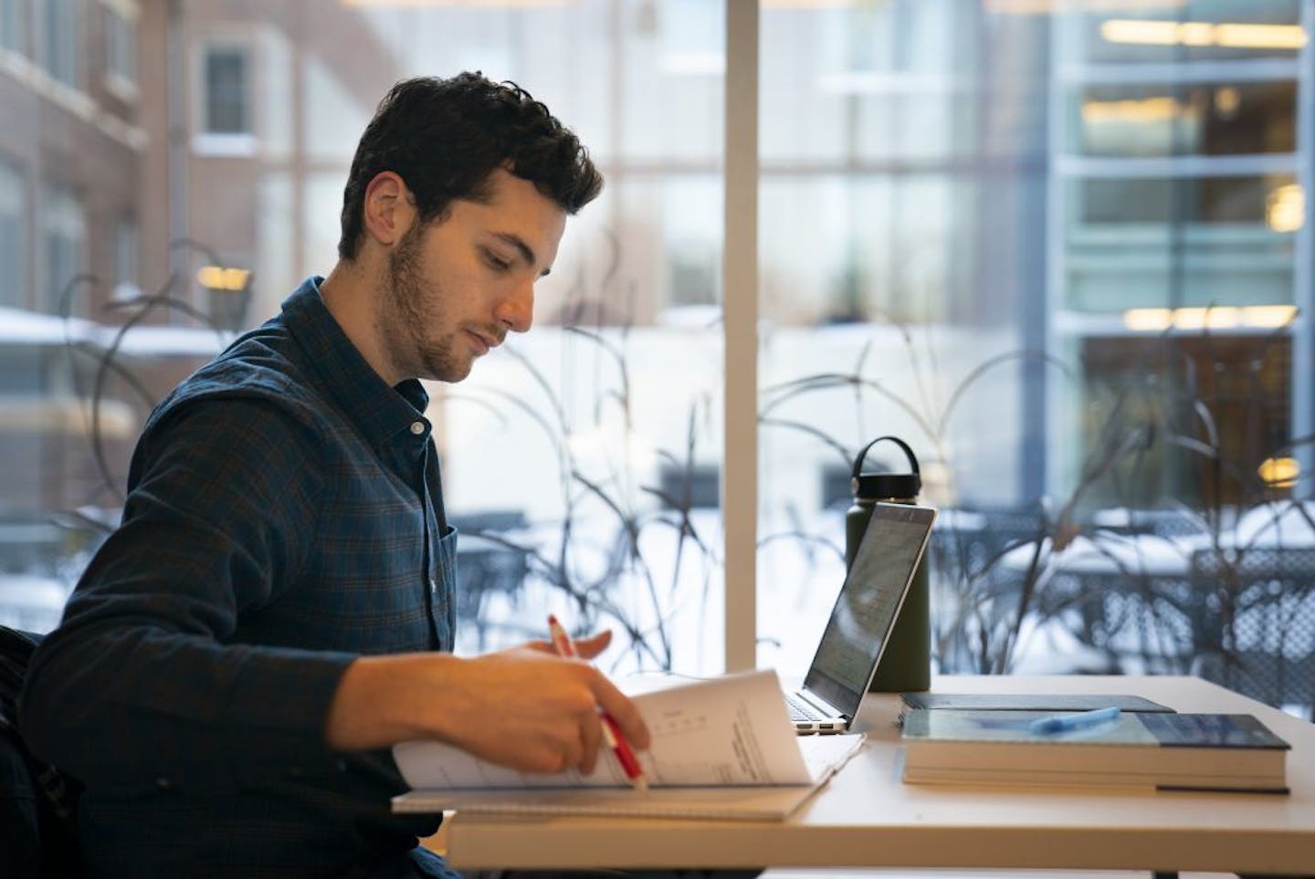 Carleton College student Ross Matican did statistics homework at the Weitz Center for Creativity in Northfield, Minn., on Wednesday, January 30, 2019. Matican struggled with health issues during a semester abroad in India this past fall.