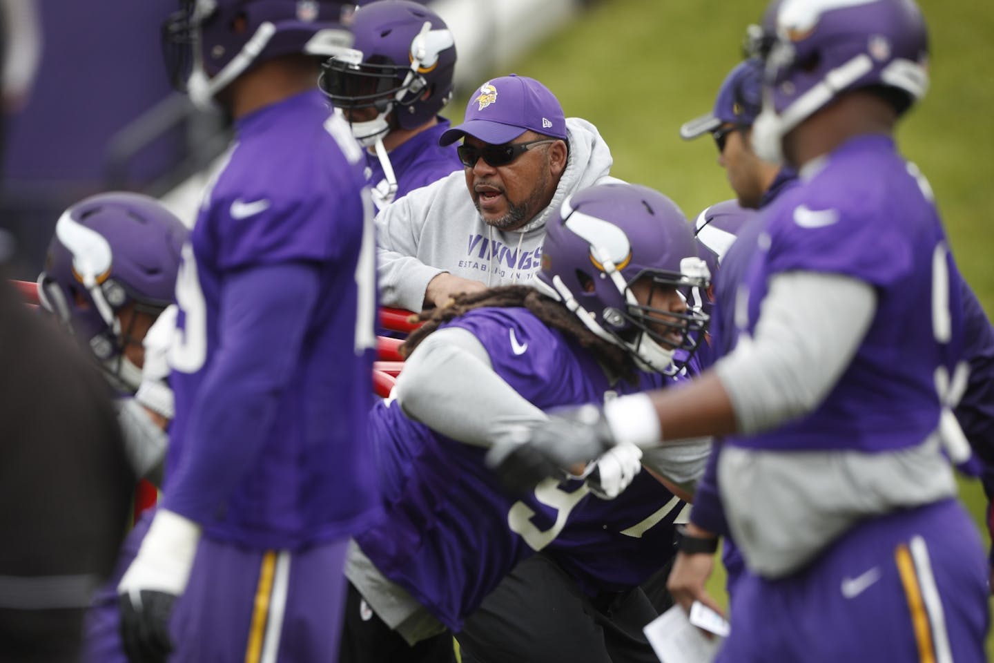 Andre Patterson defensive line coach watched players run drills during the Vikings first organized full-team practice of the offseason at Winter Park Wednesday May 23, 2017 in Eden Prairie, MN.