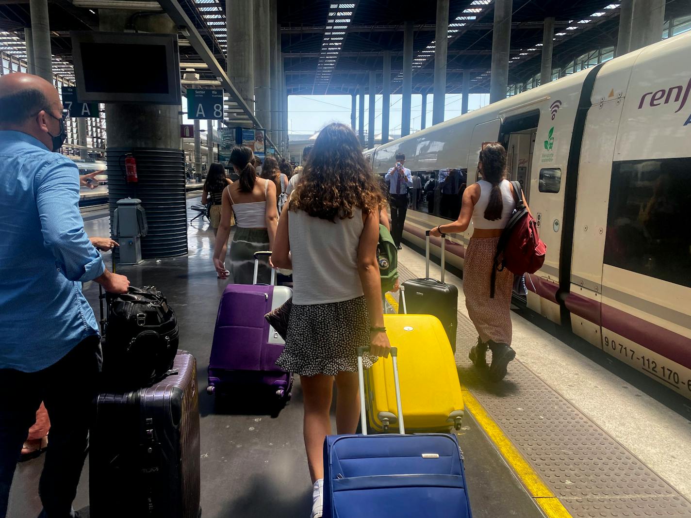 With luggage in tow, tourists arrive at a train station in Malaga, Spain, on June 14, 2021. (Claudia Nunez/Los Angeles Times/TNS) ORG XMIT: 42583359W