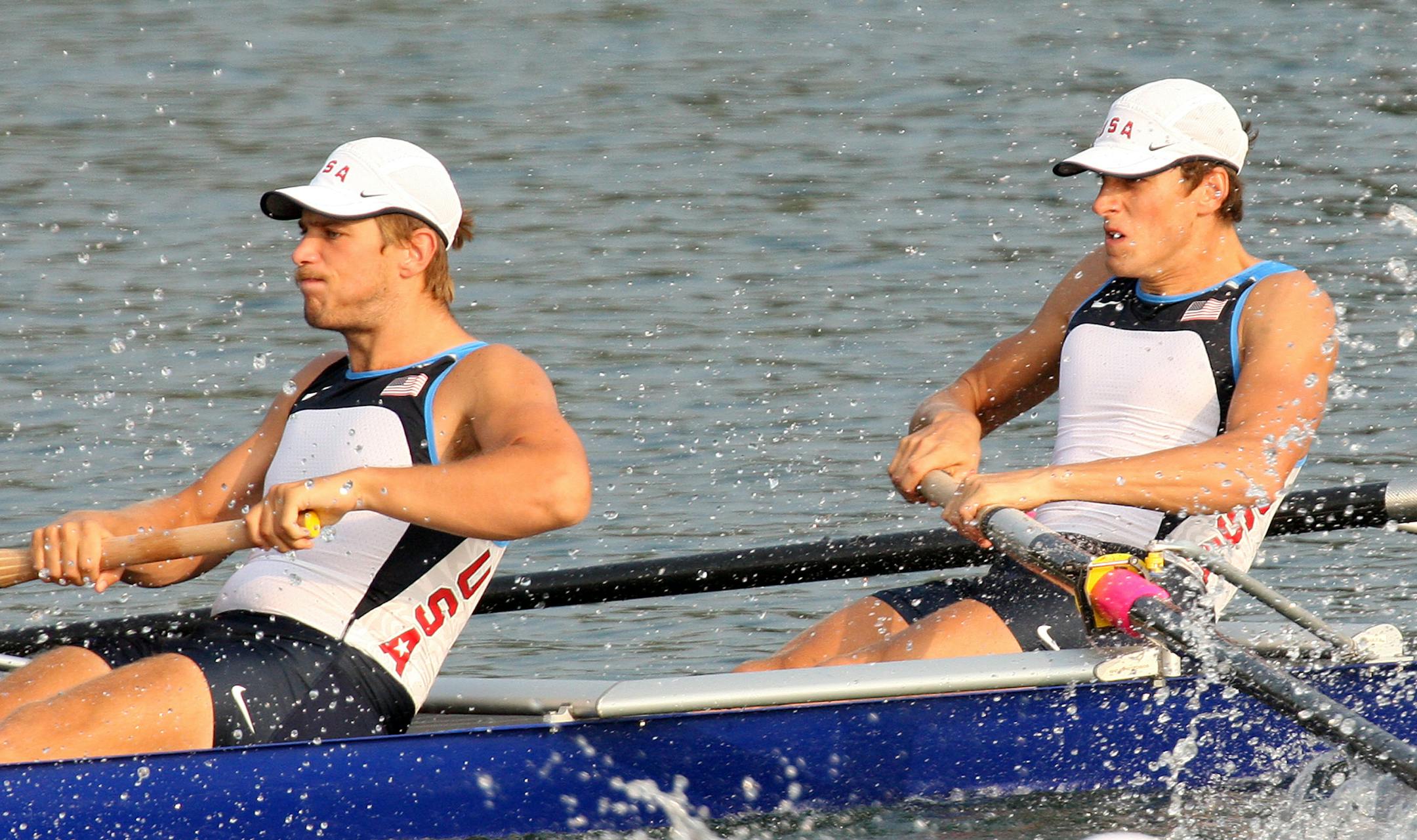 Micah Boyd, left, and Matt Schnobrich are newcomers to the U.S. men's eight boat, which won the gold four years ago. They and their U.S. teammates took an early lead Tuesday but had to rally with 500 meters ago to make Sunday's final.