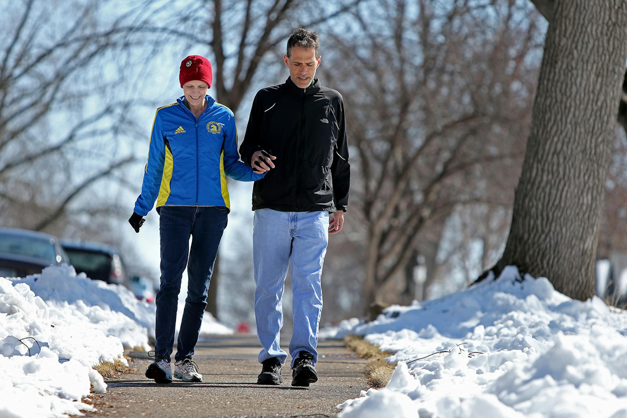 After a week of treatment, Elinor Scott went out on a walk with her boyfriend Ken Rosen early Saturday, April 5, 2014 near her home in St. Louis Park, MN. Scott, who wore her Boston Marathon jacket, was only able to make it two blocks. ] (ELIZABETH FLORES/STAR TRIBUNE) ELIZABETH FLORES • eflores@startribune.com