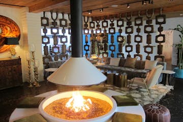 A fireplace in the lobby of the Parker Palm Springs Hotel.