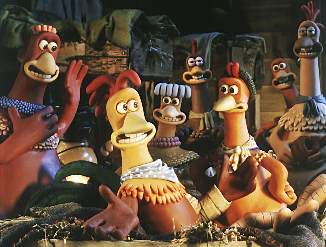 Rocky the rooster (Mel Gibson, front center) is the center of attention in the hen house with (front, left to right) Bunty (Imelda Staunton), Babs (Jane Horrocks) and Ginger (Julia Sawalha) in “Chicken Run.”