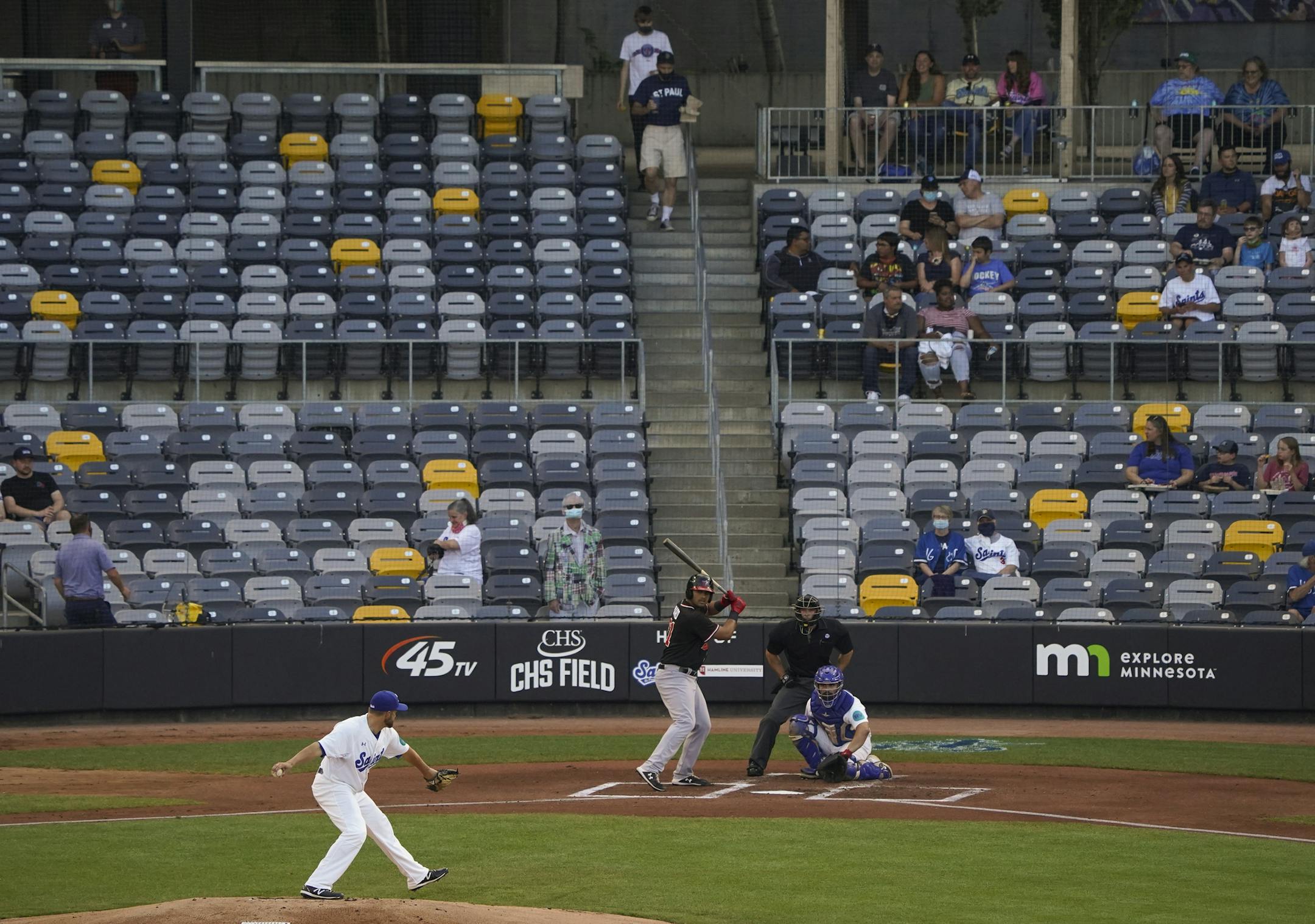 Saints starter Mike Devine threw a pitch Tuesday in the team's first true home game this season.