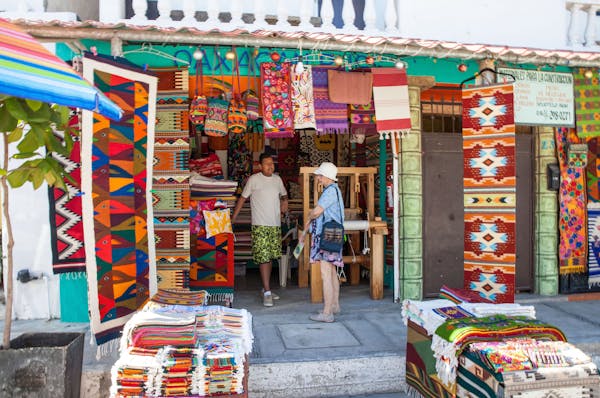 Mexico&#x2019;s many arts and crafts include woven fabrics, for sale here in Bucerias, on Banderas Bay, north of Puerto Vallarta. (Steve Haggerty/TNS)