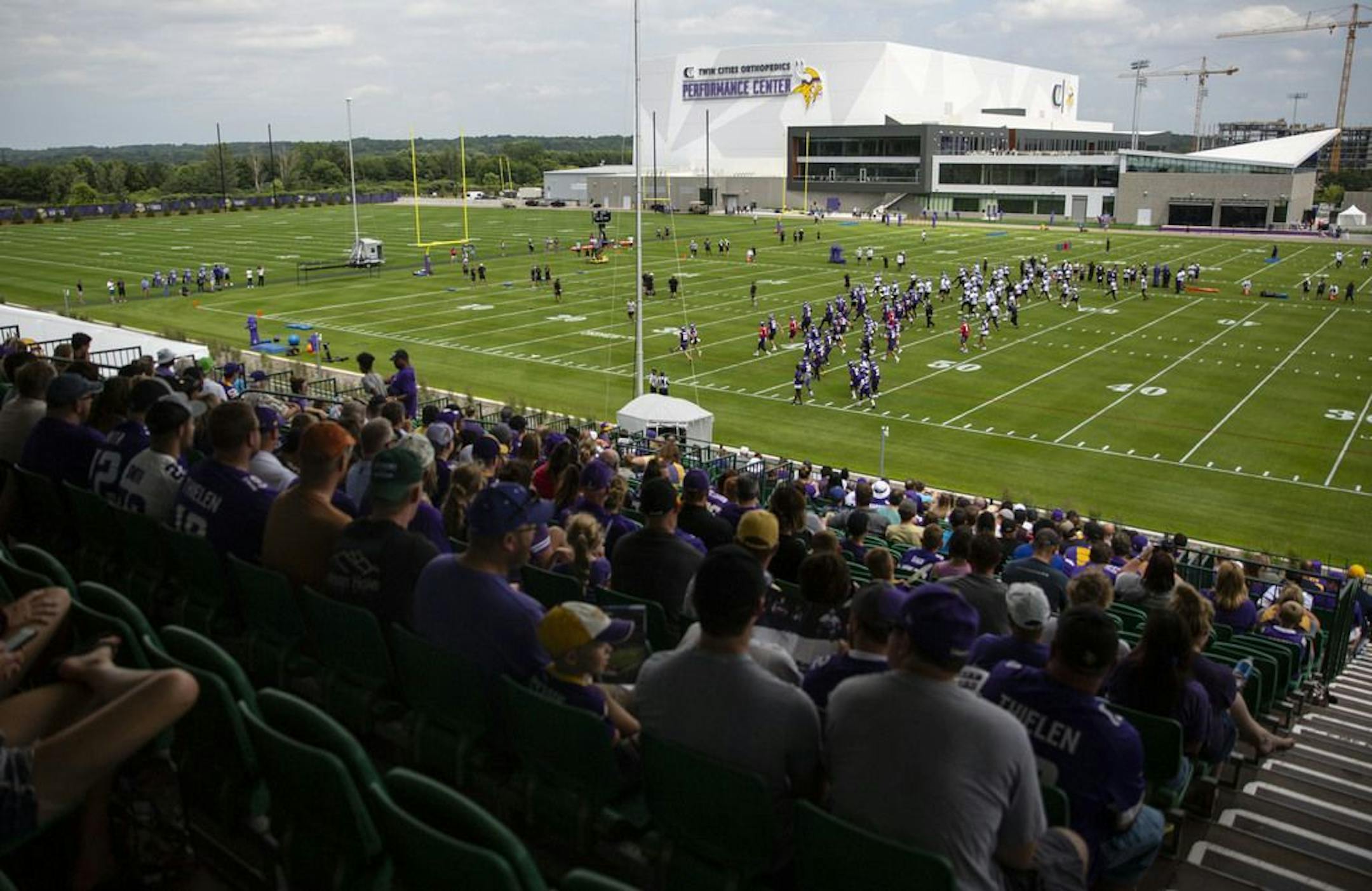 Hundreds of Vikings fans filled the stands to catch a first glimpse of the 2019 team at their first full practice on Friday. ALEX KORMANN • alex.kormann@startribune.com The Minnesota Vikings opened up their first full day of training camp on Friday July 26, 2019 at TCO Performance Center in Eagan, MN. Doors opened to fans at 11AM to watch their favorite players practice and get excited for the 2019 NFL season.
