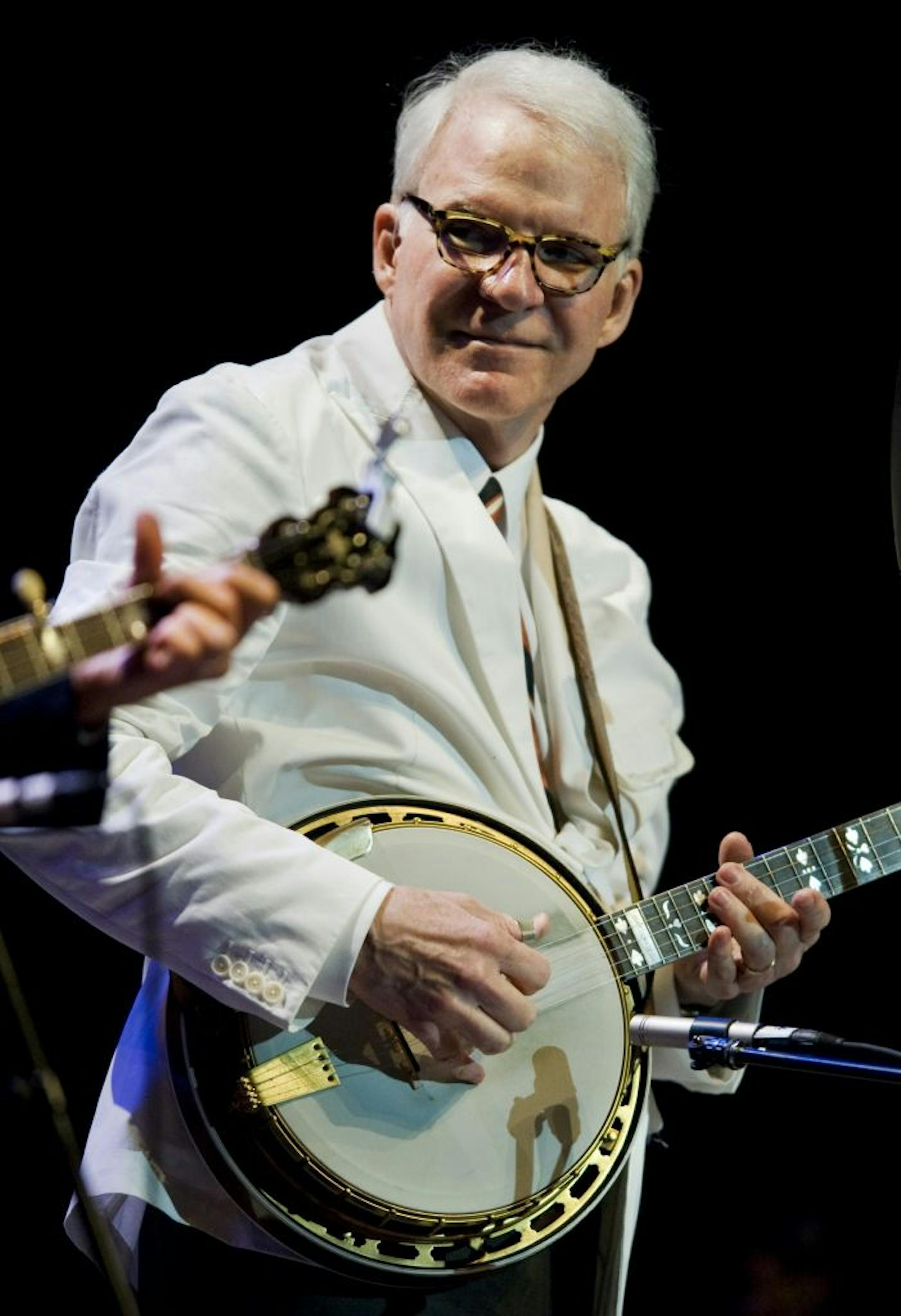 Steve Martin is doing a lot of picking and grinning these days.