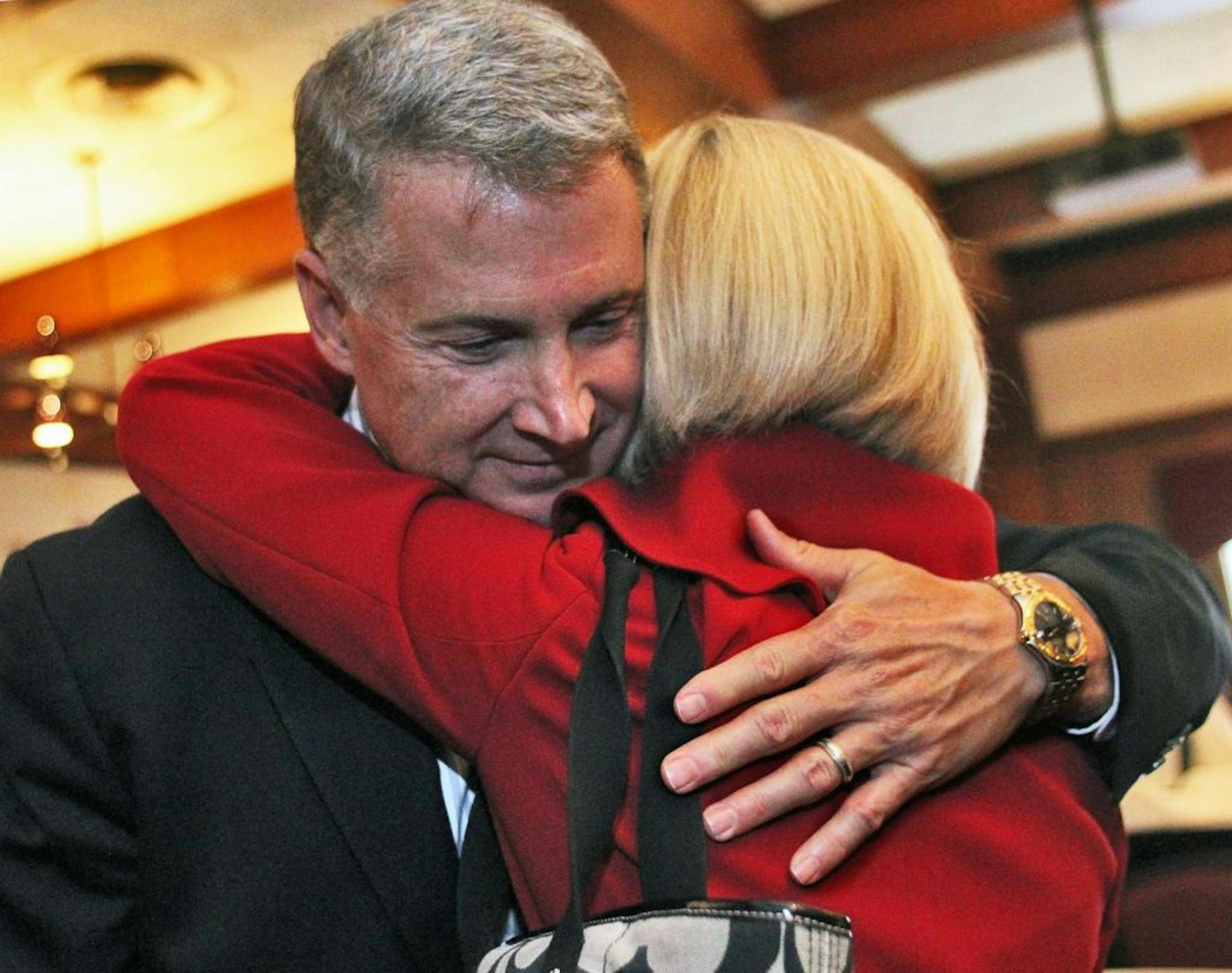 Outgoing Minneapolis police chief Tim Dolan was honored at a reception at Jax Cafe in Minneapolis. Dolan greeted friends and co-workers as they arrived at the reception. Family friend Carol Doughman gave Dolan a hug. (MARLIN LEVISON/STARTRIBUNE(mlevison@startribune.com