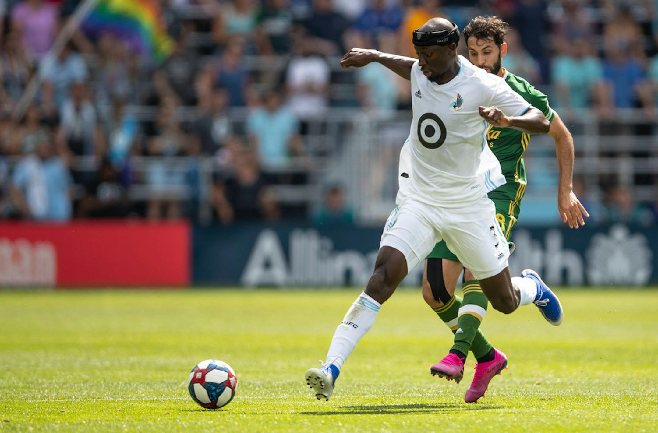 Minnesota FC defender Ike Opara (3) attempted to regain control of the ball against Portland in the first half of a match on Aug. 4 at Allianz Field.