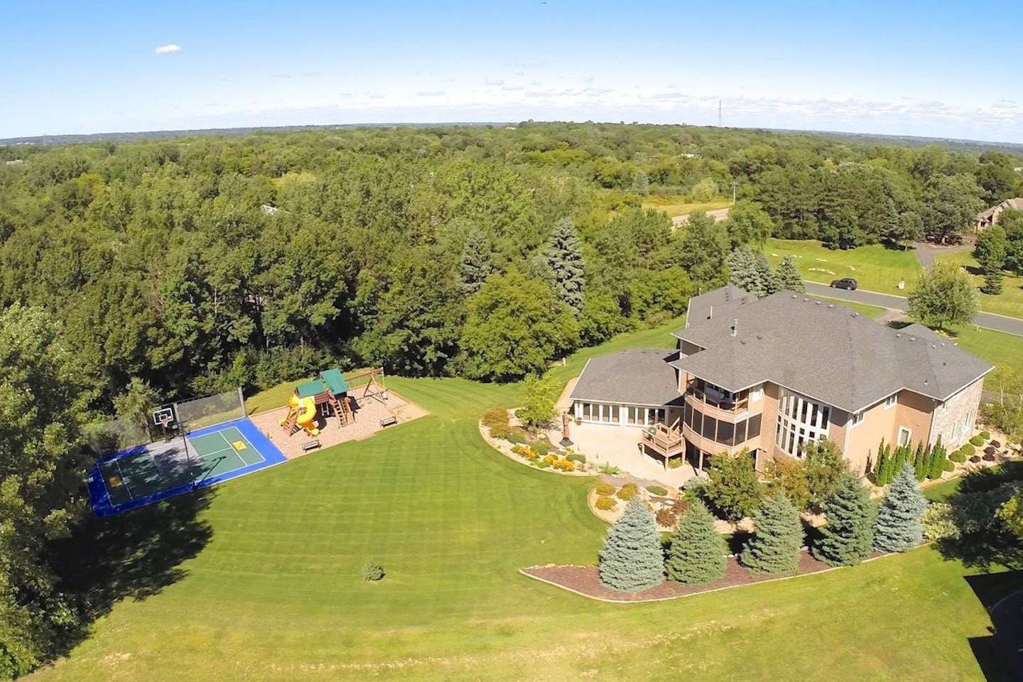 A nearly 11,000-square-foot home in Inver Grove Heights comes with indoor pool, wine room, theater, seven garage stalls and a Corvette.