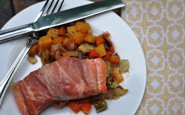 Credit: Meredith Deeds, Special to the Star Tribune Proscuitto-wrapped salmon with roasted vegetables.