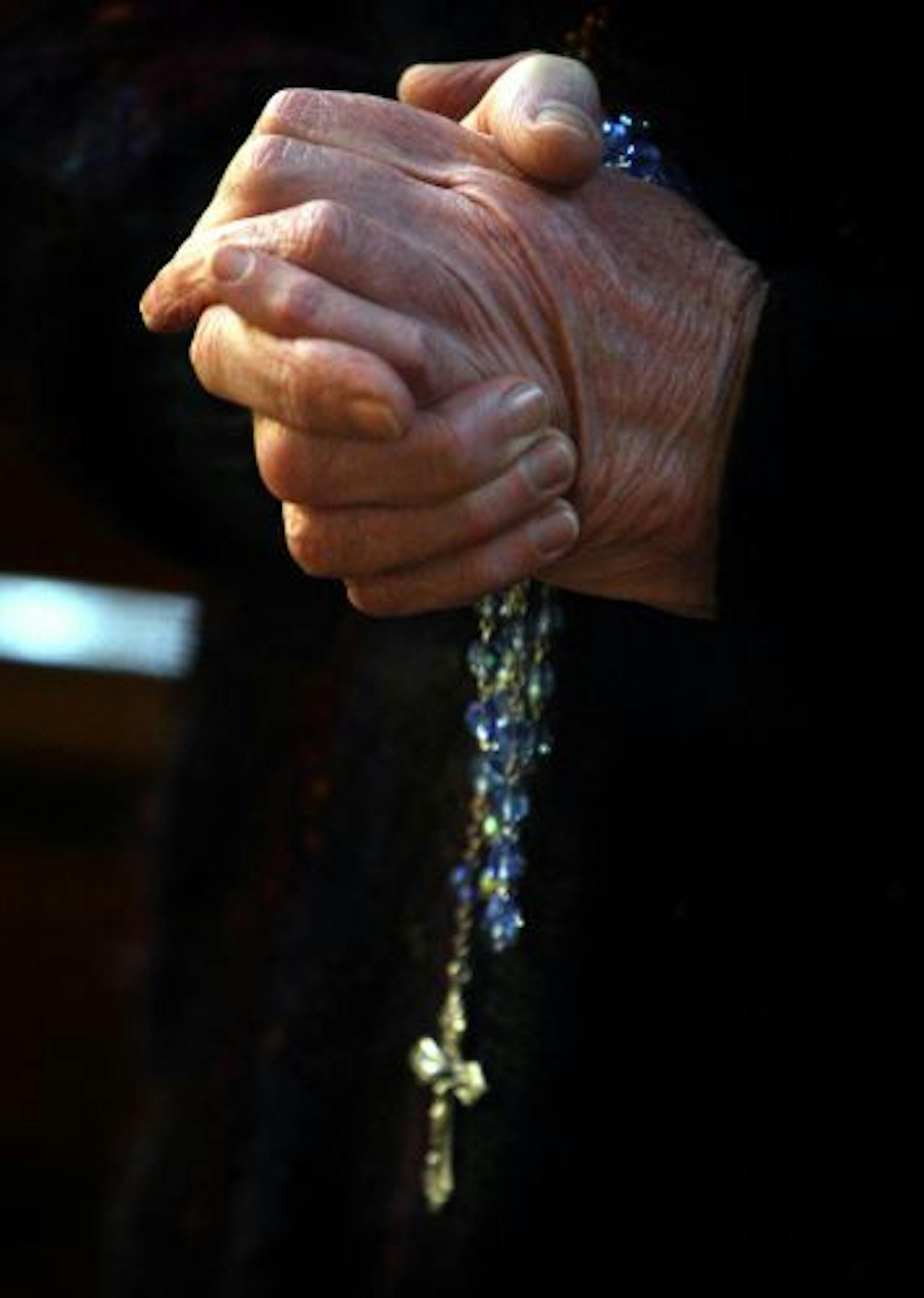 A woman prays during a service at St Patrick's Cathedral in Armagh, Northern Ireland Saturday March 20, 2010. Pope Benedict XVI has rebuked Irish bishops for "grave errors of judgment" in handling clerical sex abuse and ordered a Vatican investigation into the Irish church to wipe out the scourge. The letter released Saturday directly addressed only Ireland but the Vatican said it could be read as applying to other countries. Hundreds of new abuse allegations recently came to light across Europe