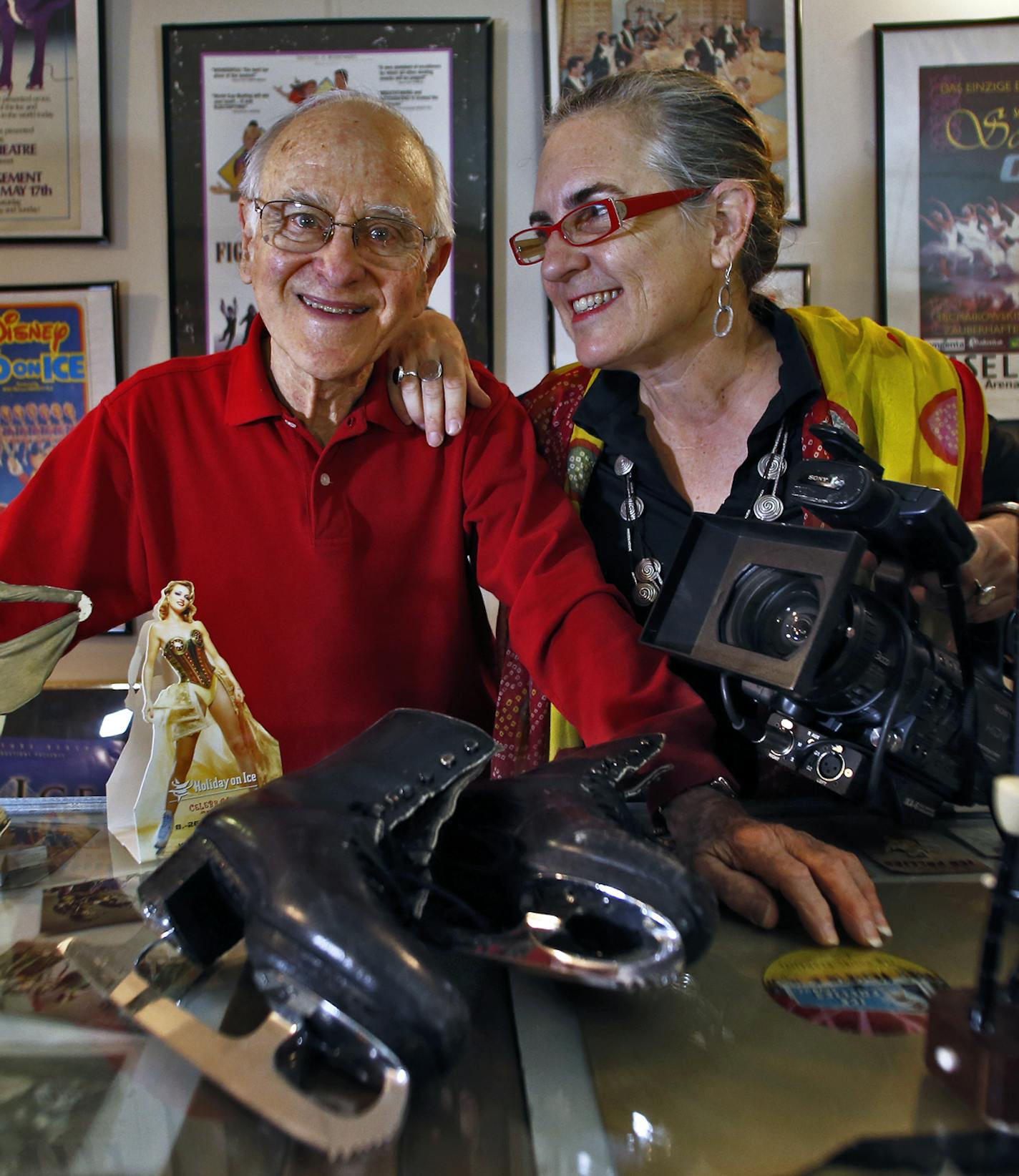 Roy Blakey, left, and Keri Pickett with skating items Blakey has collected. ] Roy Blakey is a former professional figure skater who has collected over 26,000 skating related items at his studio in Minneapolis. Filmmaker Keri Pickett has produced a documentary film on Blakey. . (MARLIN LEVISON/STARTRIBUNE(mlevison@startribune.com)