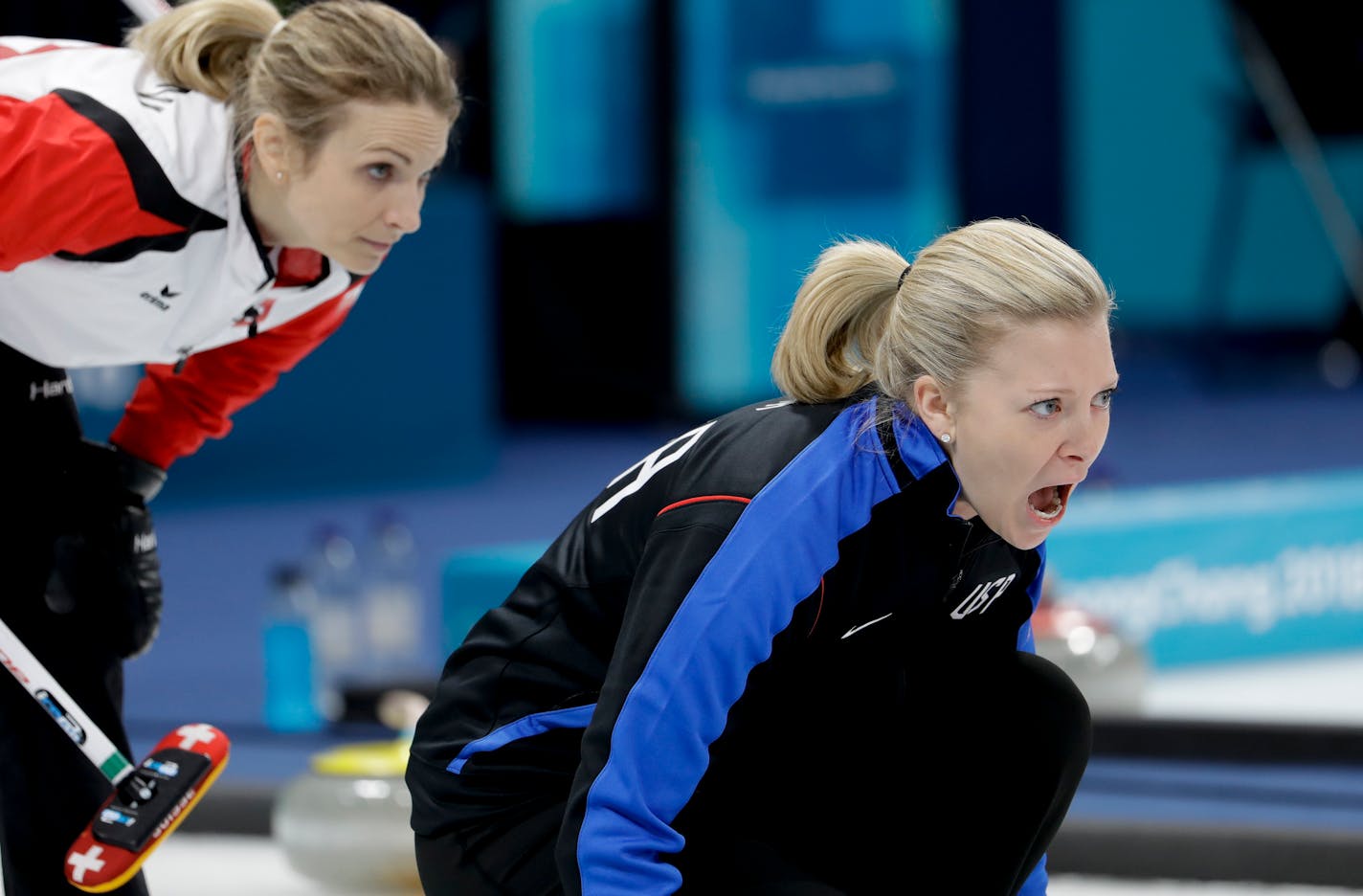 United States skip Nina Roth, right, made a call as Switzerland skip Silvana Tirinzoni looked on during a women's curling match at the 2018 Winter Olympics in Gangneung, South Korea.