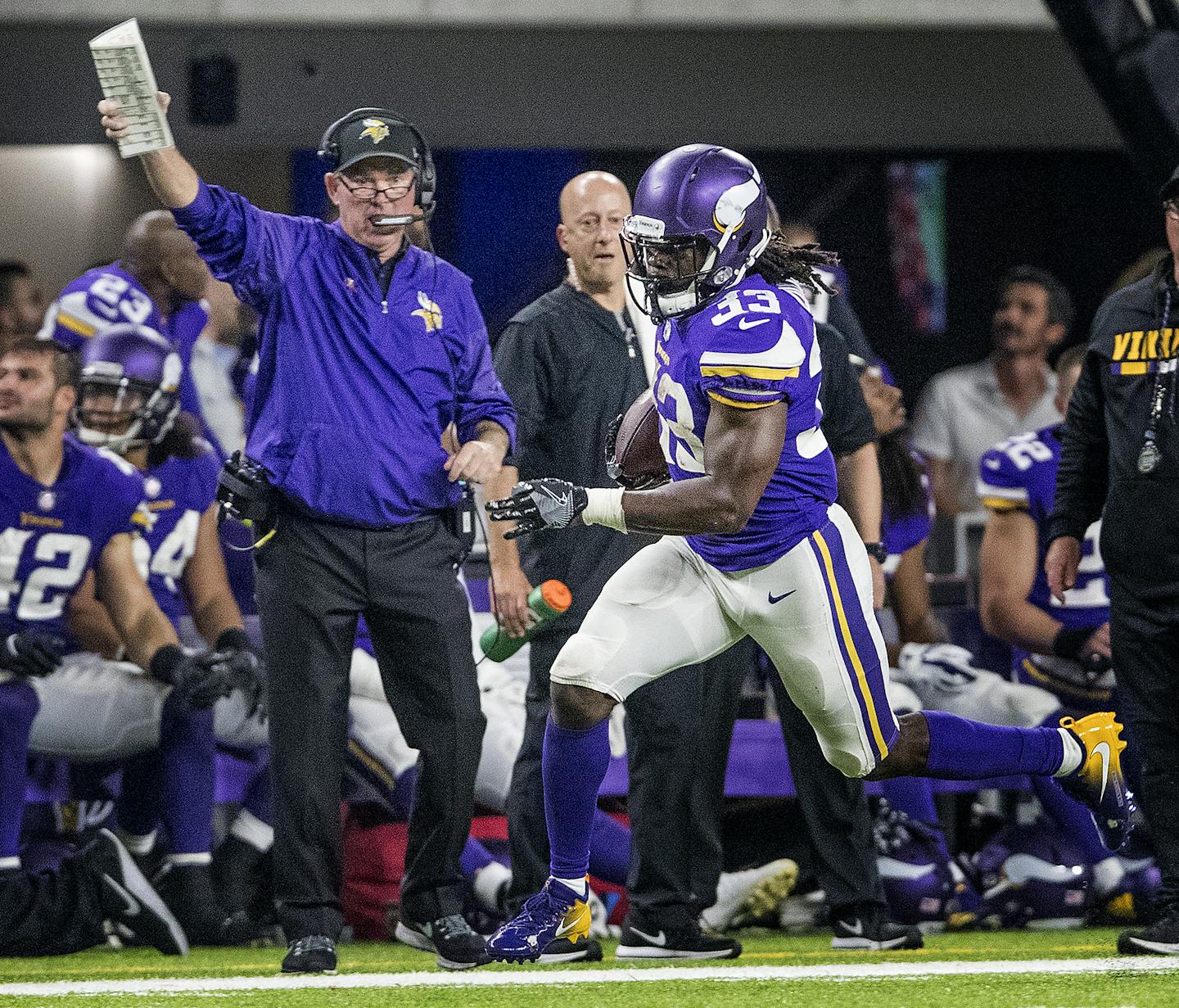 Vikings head coach Mike Zimmer watched running back Dalvin Cook on a run in the fourth quarter. Cook set a Vikings record for most rushing yards by a rookie in an NFL debut.