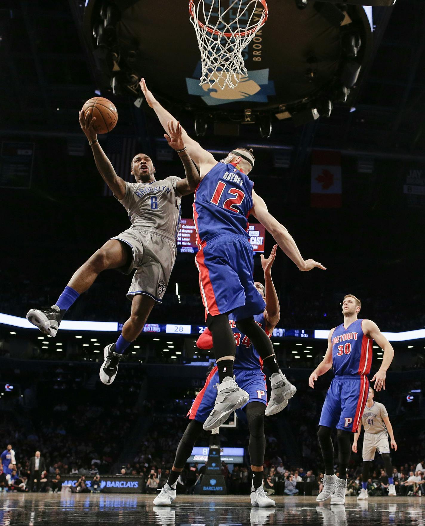 Brooklyn Nets guard Sean Kilpatrick (6) shoots against Detroit Pistons forward Aron Baynes (12) during the first quarter of an NBA basketball game, Wednesday, Nov. 2, 2016, in New York. (AP Photo/Julie Jacobson)