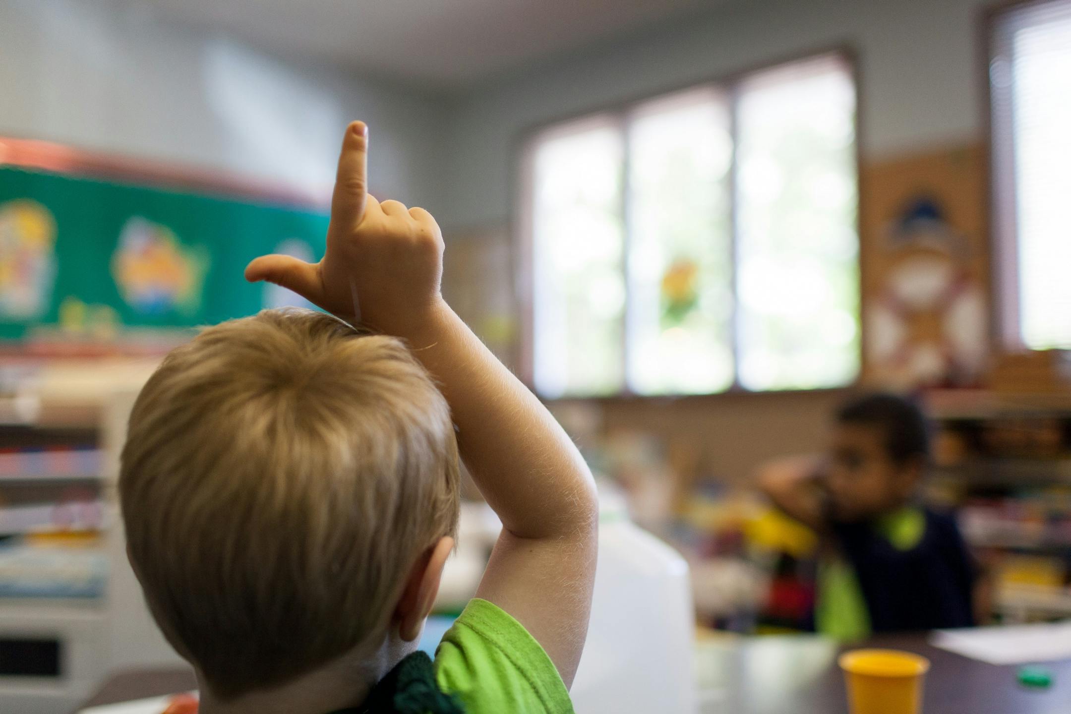 OVERLAND PARK, KS - AUGUST 15, 2012 With the passage of Lexi's Law, the state of Kansas rose from the near bottom of the list of states for regulation of daycare's to number three in the U.S. This is afternoon snack timel at Kiddie Kampus, a daycare provider in Overland Park, KS. An organization called Day Care Connection, in Lenexa, KS, works to educate day care providers with up-to-date information about child care and changing state regulations for providing care. Day Care Connection also wor