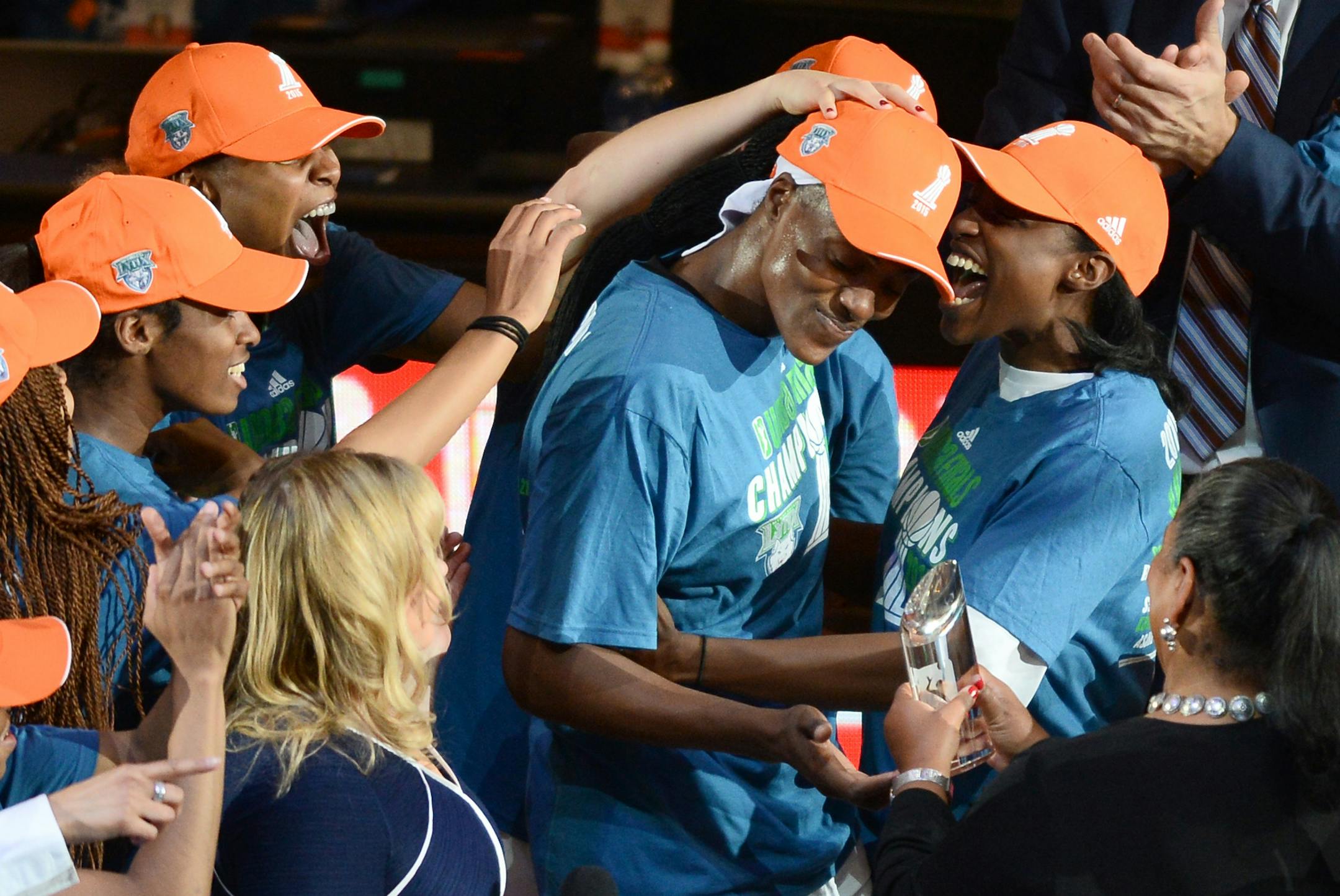 Minnesota Lynx center Sylvia Fowles (34), center, was congratulated by teammates including guard Kalana Greene (3), right, after being awarded with the MVP award Wednesday. ] (AARON LAVINSKY/STAR TRIBUNE) aaron.lavinsky@startribune.com Game 5 of the WNBA finals Lynx vs Indiana at the Target Center in Minneapolis, Min., Wednesday October 14, 2015.