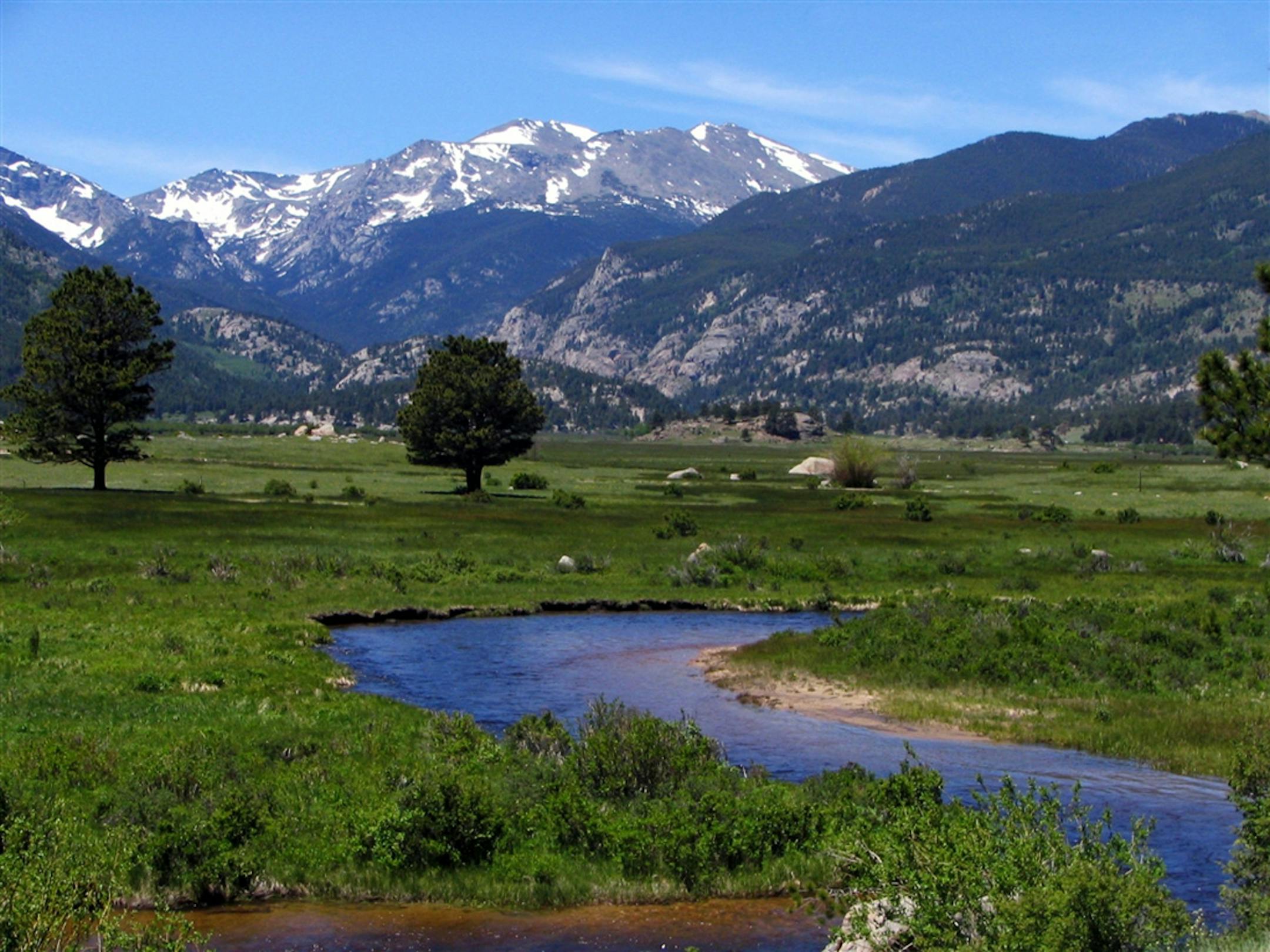 Even if you didn't want to hike through Rocky Mountain National Park, you could easily fill a few days pulling over at scenic overlooks, including this view of the valley on the way to Bear Lake.