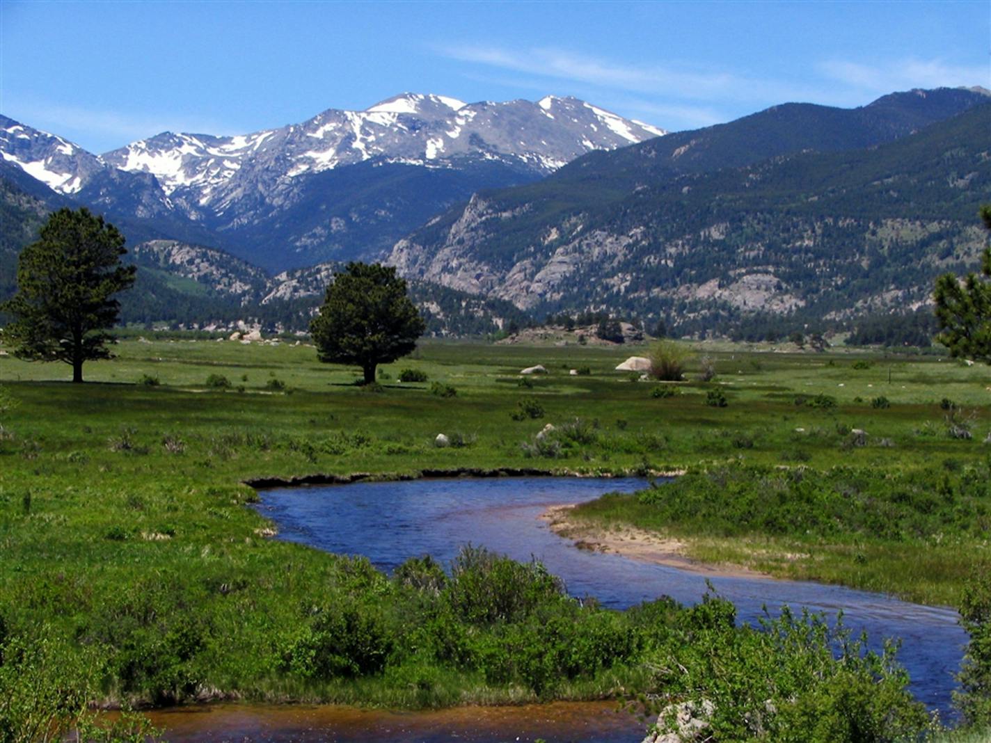 Even if you didn't want to hike through Rocky Mountain National Park, you could easily fill a few days pulling over at scenic overlooks, including this view of the valley on the way to Bear Lake.