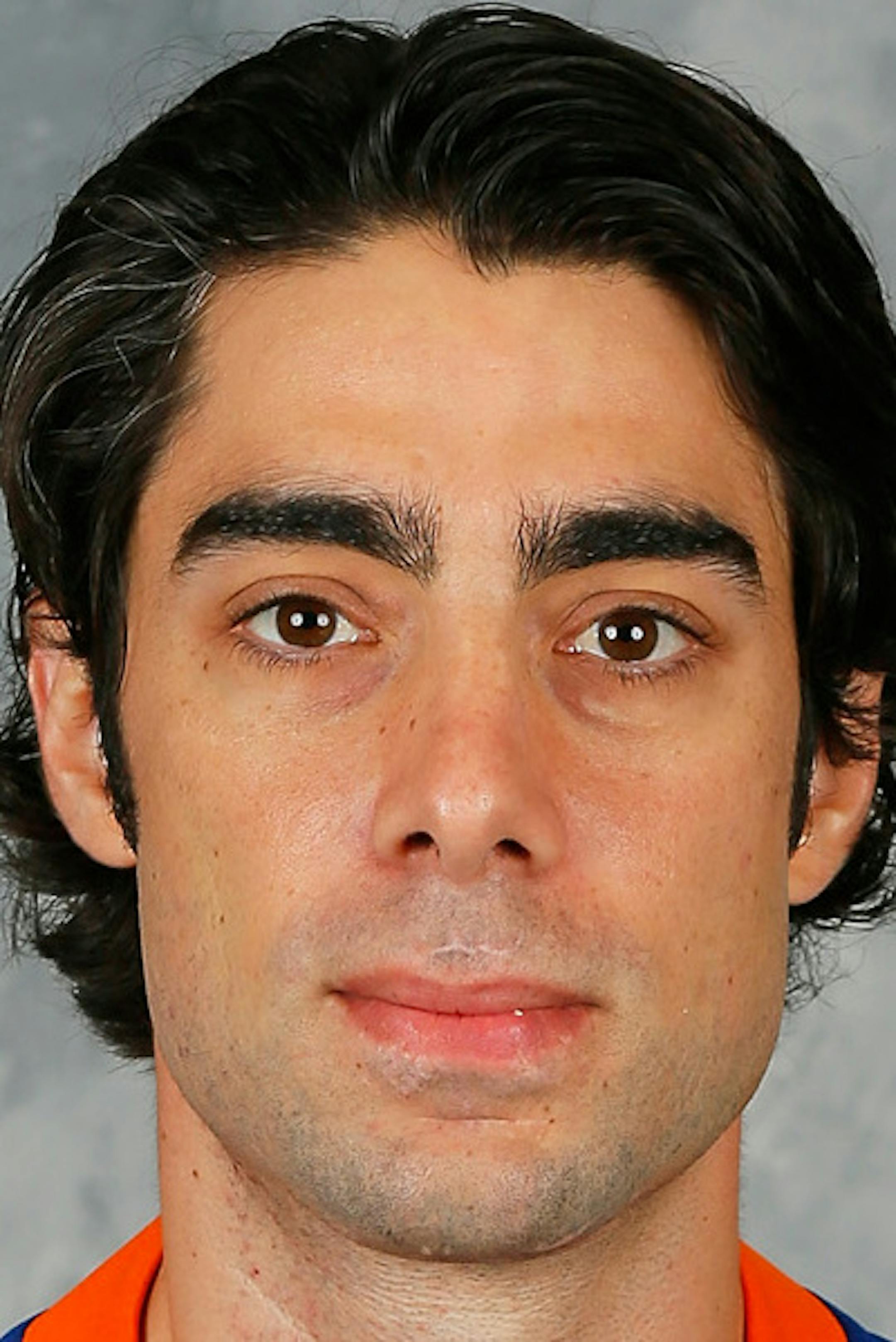 UNIONDALE, NY - SEPTEMBER 11: Matt.Moulson of the New York Islanders poses for his official headshot for the 2013-2014 season on September 11, 2013 at the Nassau Coliseum in Uniondale, New York. (Photo by Mike Stobe/NHLI via Getty Images) *** Local Caption *** Matt Moulson ORG XMIT: 177614319