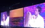 Beyonce and Jay-Z perform in concert at US Bank Stadium Wednesday evening. In this photos, their images appear on a large screen at the concert.