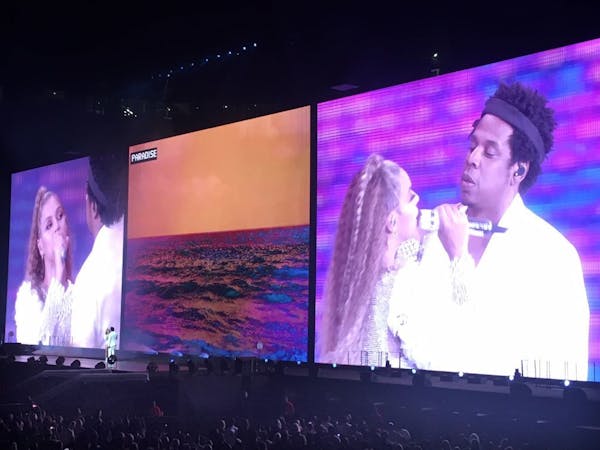 Beyonce and Jay-Z perform in concert at US Bank Stadium Wednesday evening. In this photos, their images appear on a large screen at the concert.