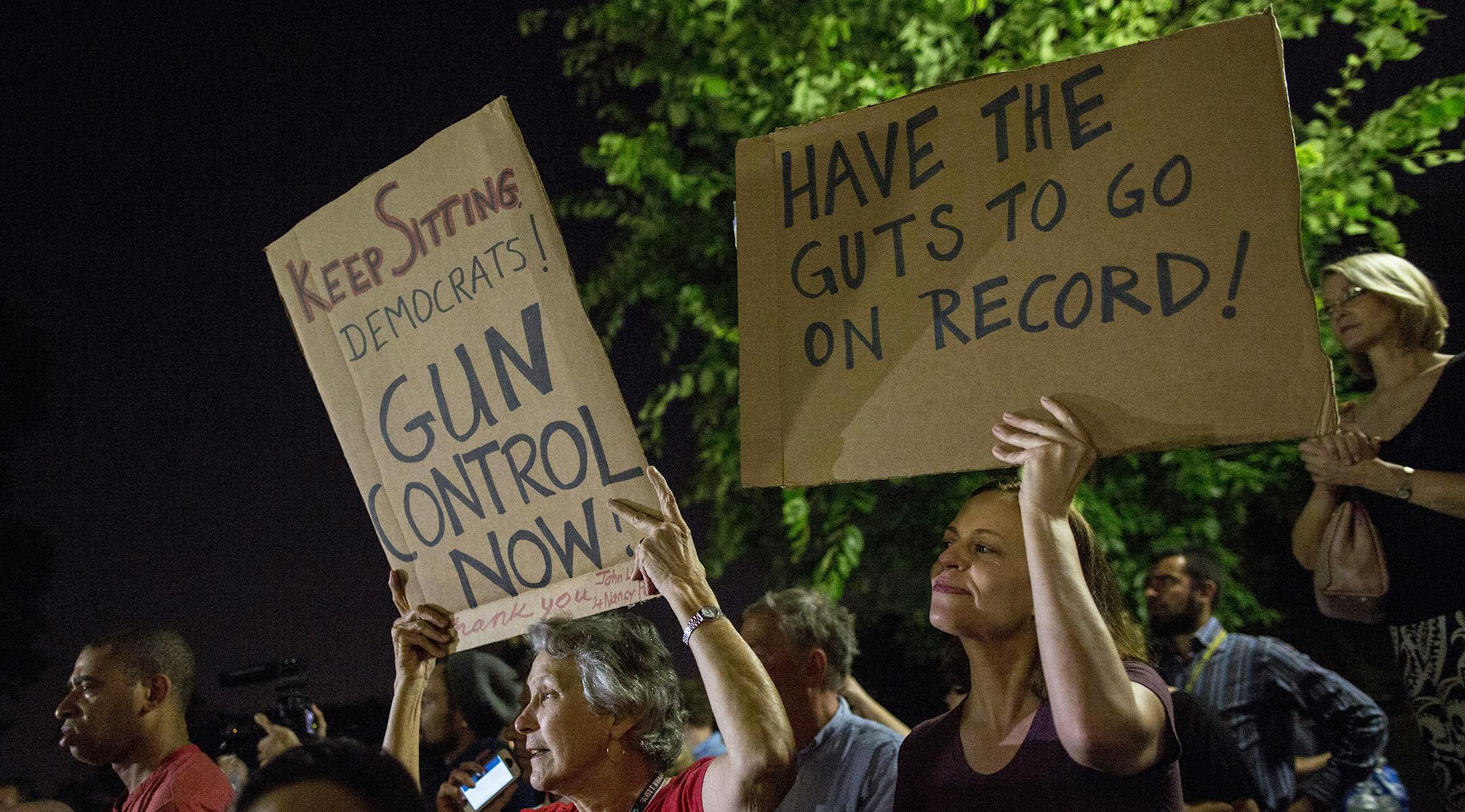 Supporters of a sit-in outside the U.S. Capitol in Washington early Thursday morning, June 23, 2016. A Democratic protest starting Wednesday demanded votes on gun-control legislation and led to pandemonium in the House chamber that did not end until early Thursday, when the House Speaker and his fellow Republicans reclaimed control long enough to force through a major spending bill. (Al Drago/The New York Times) ORG XMIT: MIN2016062314511610