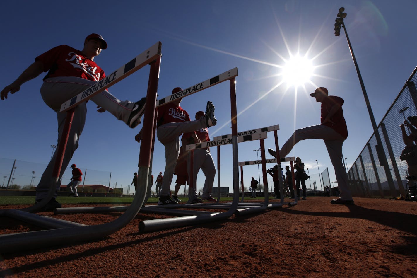 Cincinnati Reds pitchers workout during spring training baseball in Goodyear, Ariz., Saturday, Feb. 16, 2013.