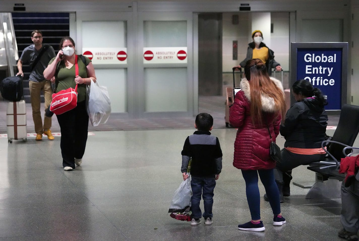 Passengers from a Delta Air Lines flight that took off from Seoul, South Korea, arrived at Minneapolis-St. Paul Airport in February.