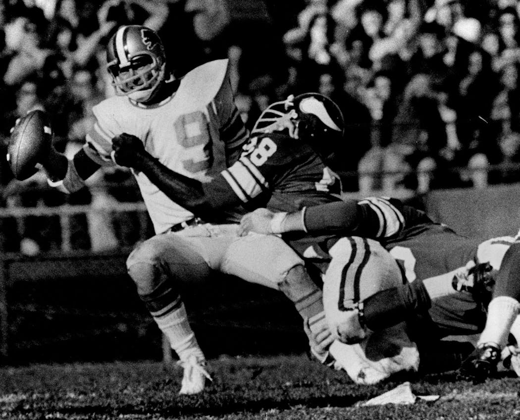 Alan Page was a Hall of Fame tackle who played for the Vikings from 1967 to 1978. He’s shown here sacking a Detroit quarterback during a game in 1975.