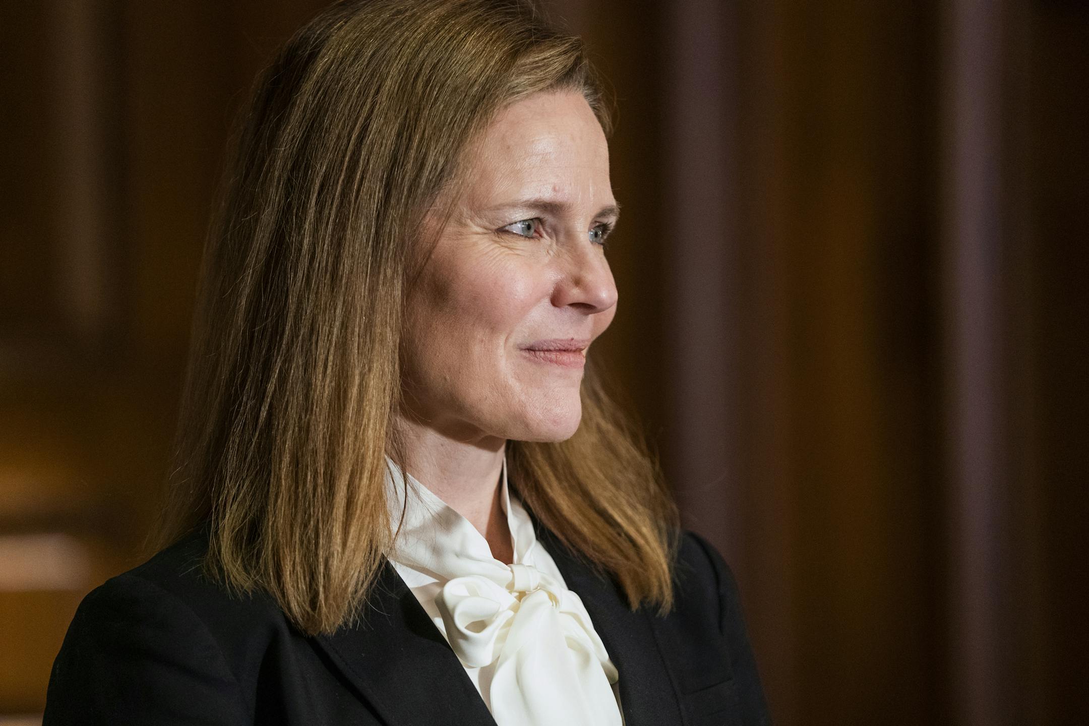 Judge Amy Coney Barrett, President Donald Trumps nominee for the U.S. Supreme Court, meets with Sen. Bill Cassidy, R-La., on Capitol Hill in Washington, Thursday, Oct. 1, 2020. (Jim Lo Scalzo/Pool via AP)