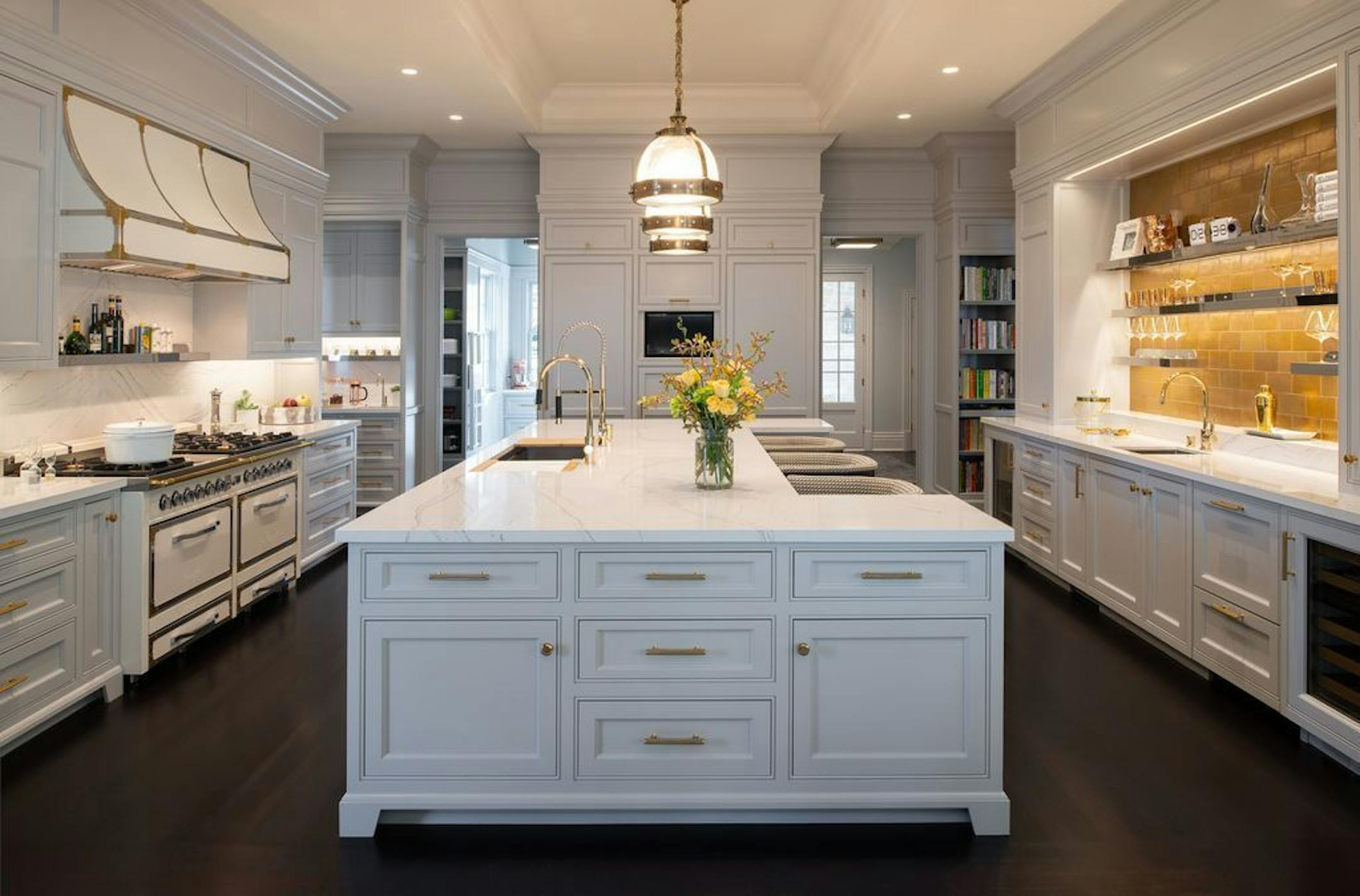 Remodeled chef's kitchen features a custom hood above a Viking range, brass hardware and wet bar, designed by Andrea Swan, Swan Architecture. She is one of the Twin Cities architects on the panel for the "Your Ideal Home" event April 25.